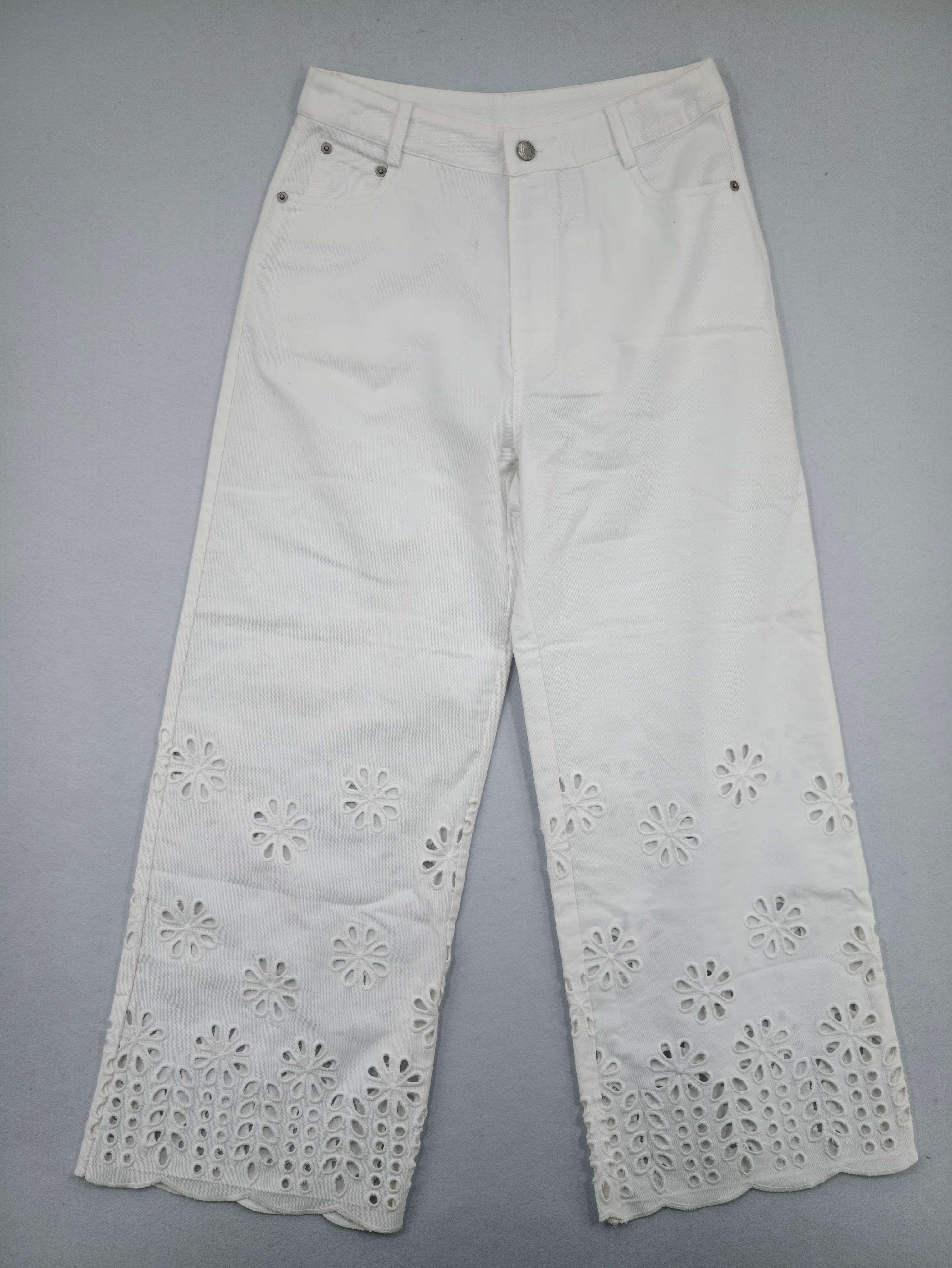 Floral eyelet cotton twill pants back view on model