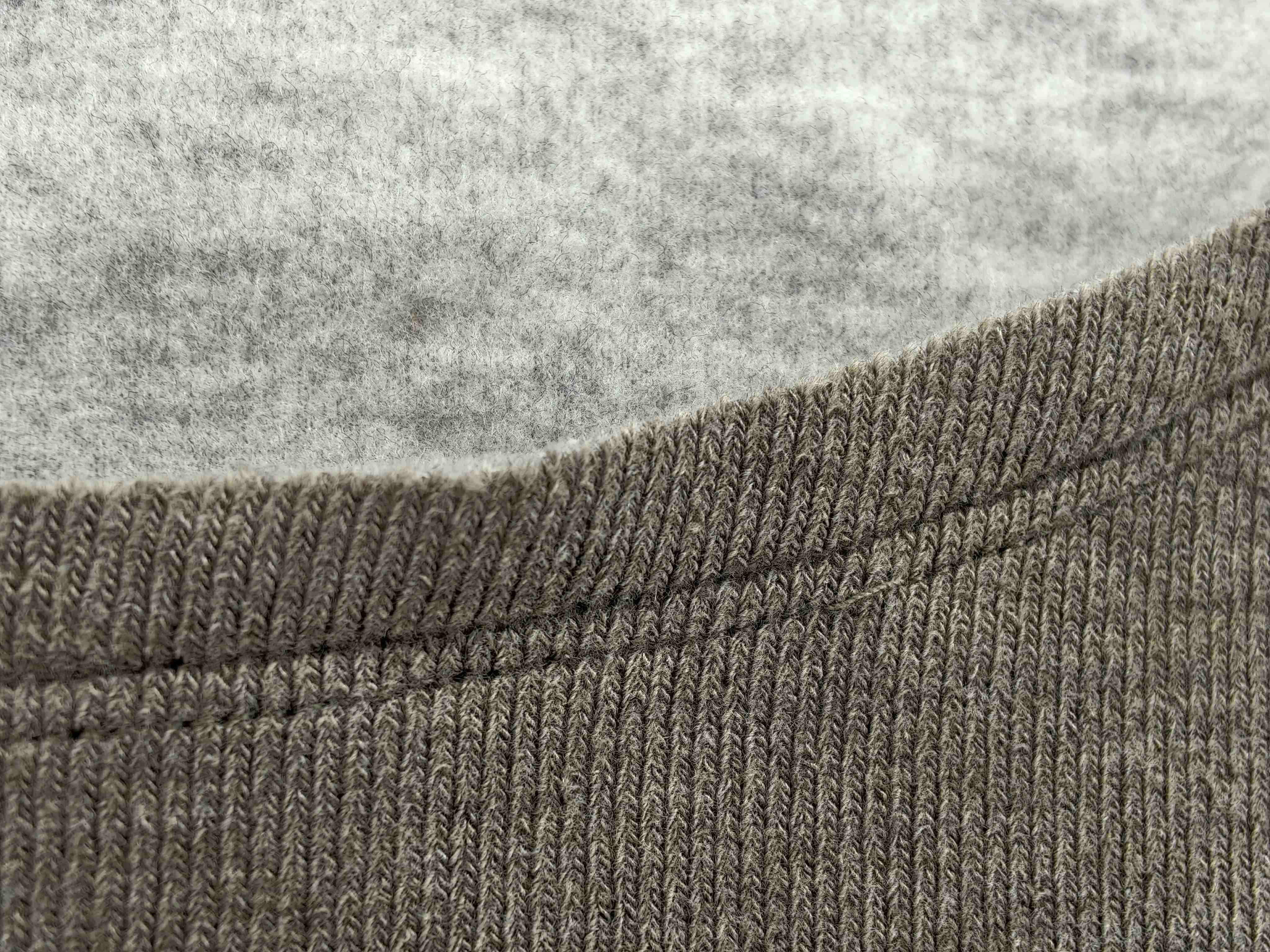 Brushed rib texture and straight hem stitching detail