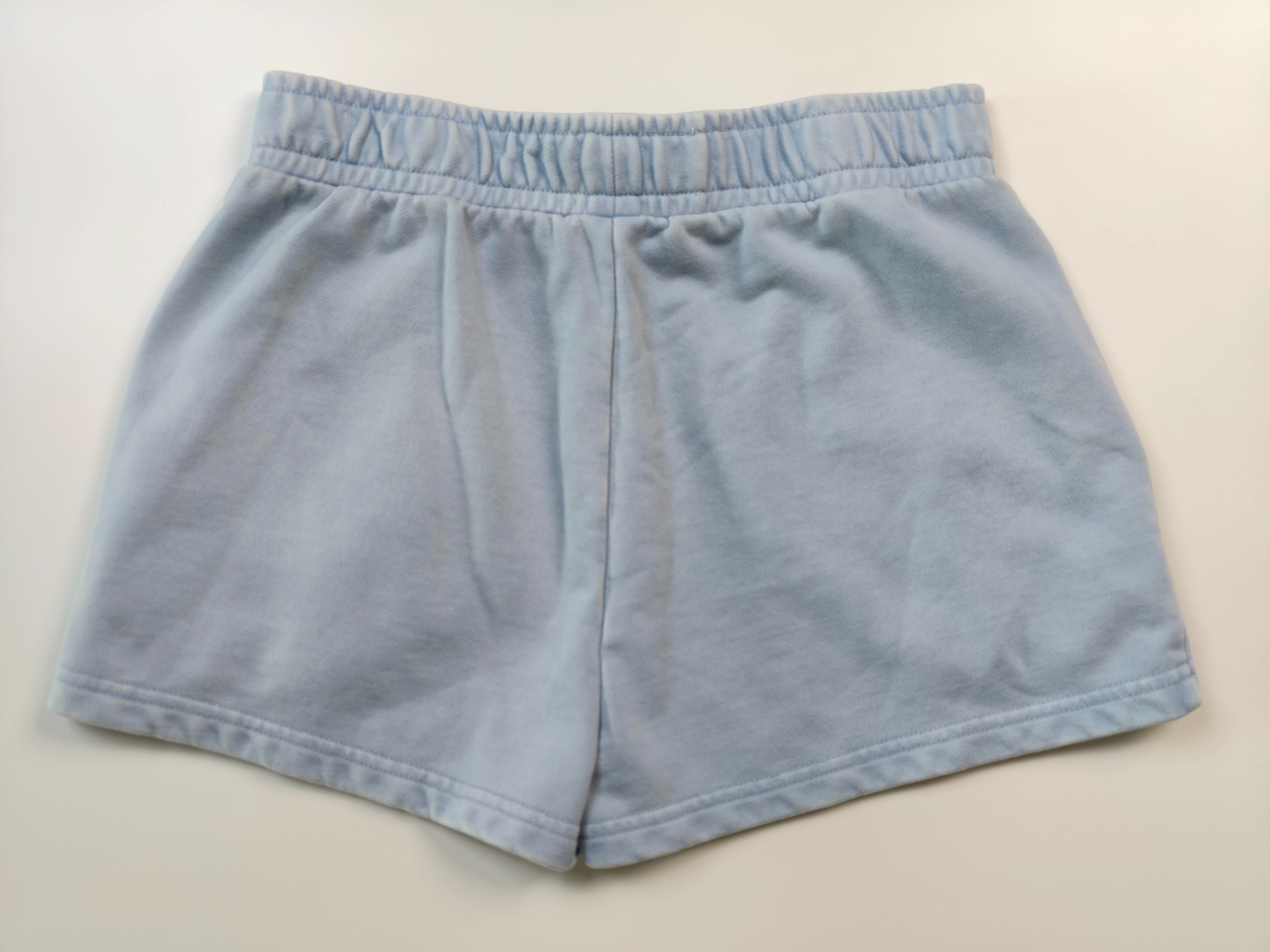 Garment-dyed waistband and center-back seam construction detail
