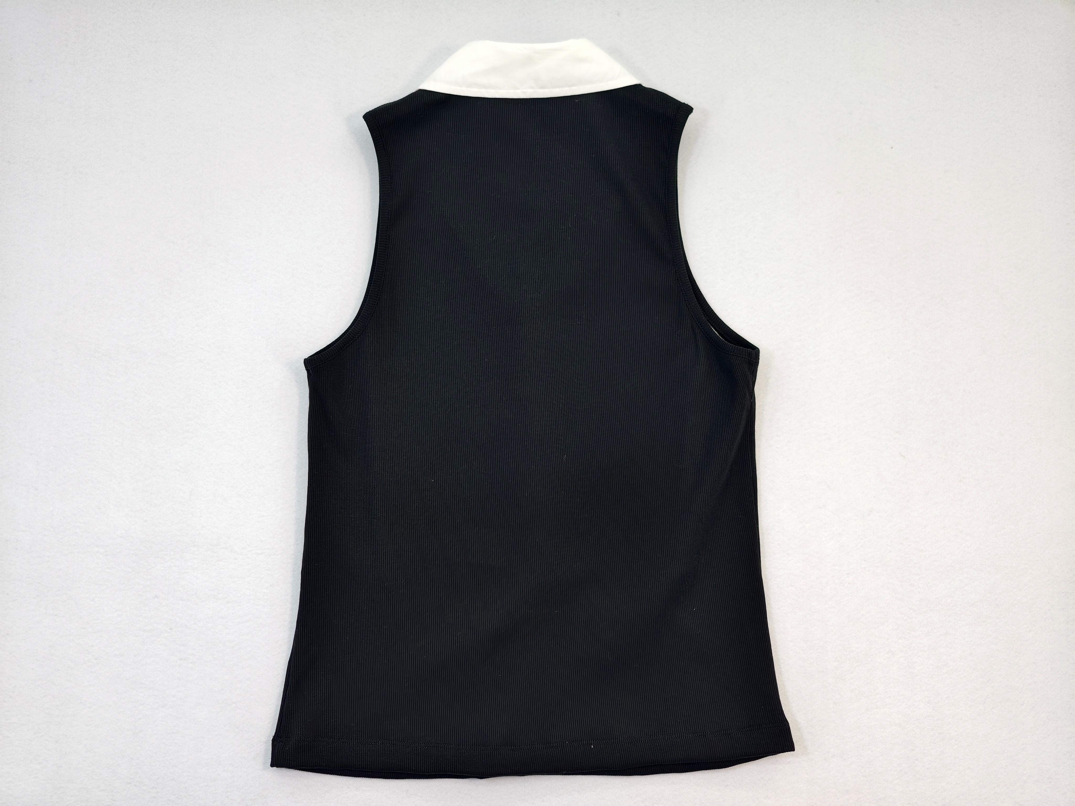Back view of fitted black sleeveless polo top