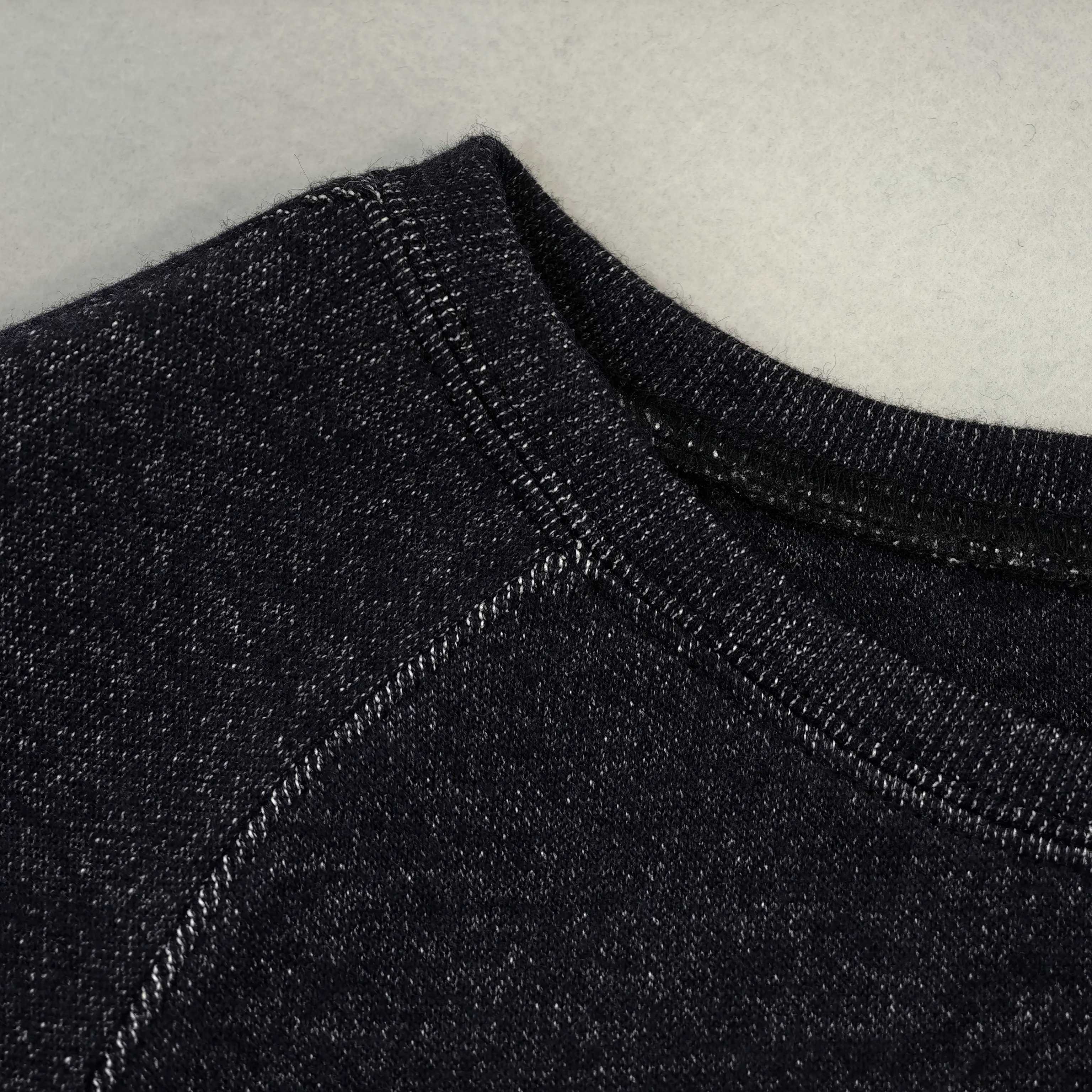 Crew neckline and raglan seam construction close-up