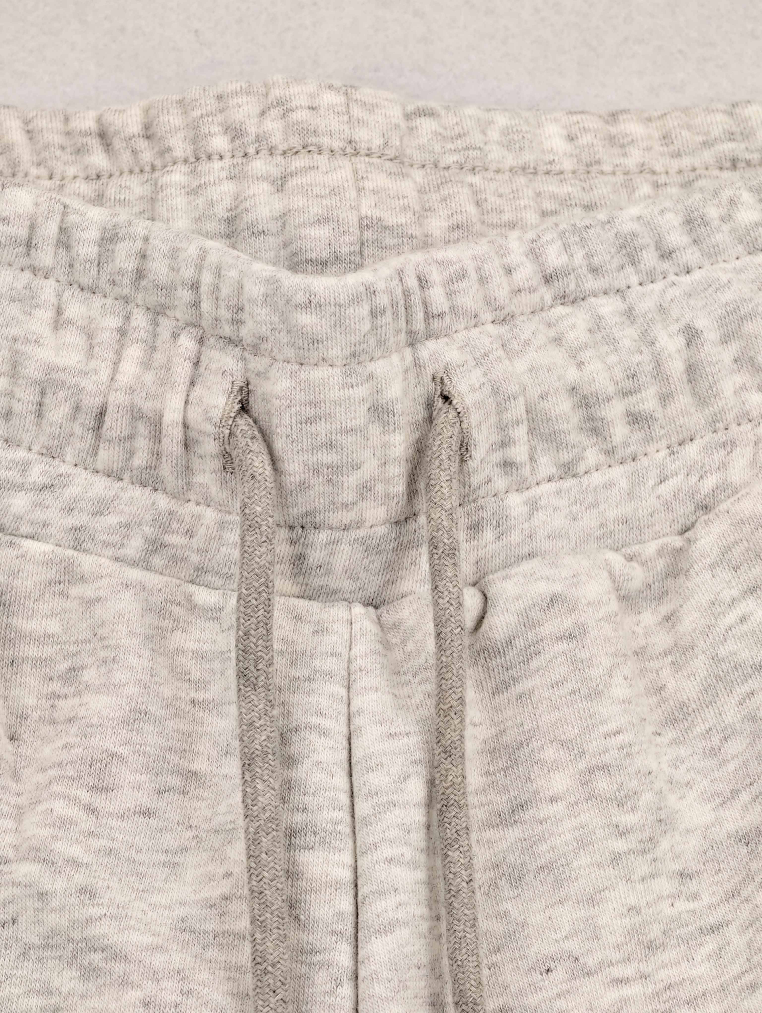 Elastic rib waistband with adjustable tonal drawcord