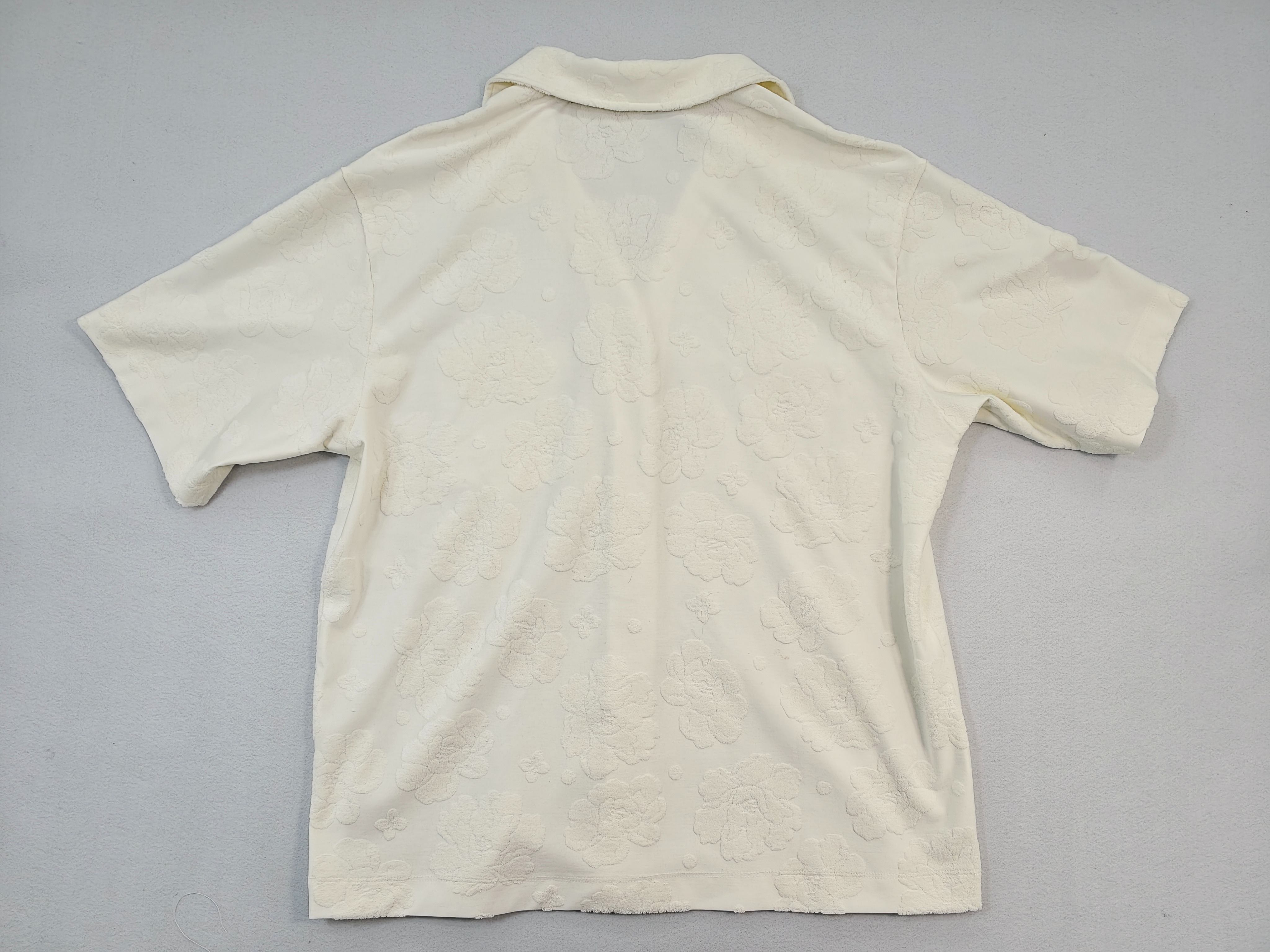 Back view of relaxed raised-texture short-sleeve shirt
