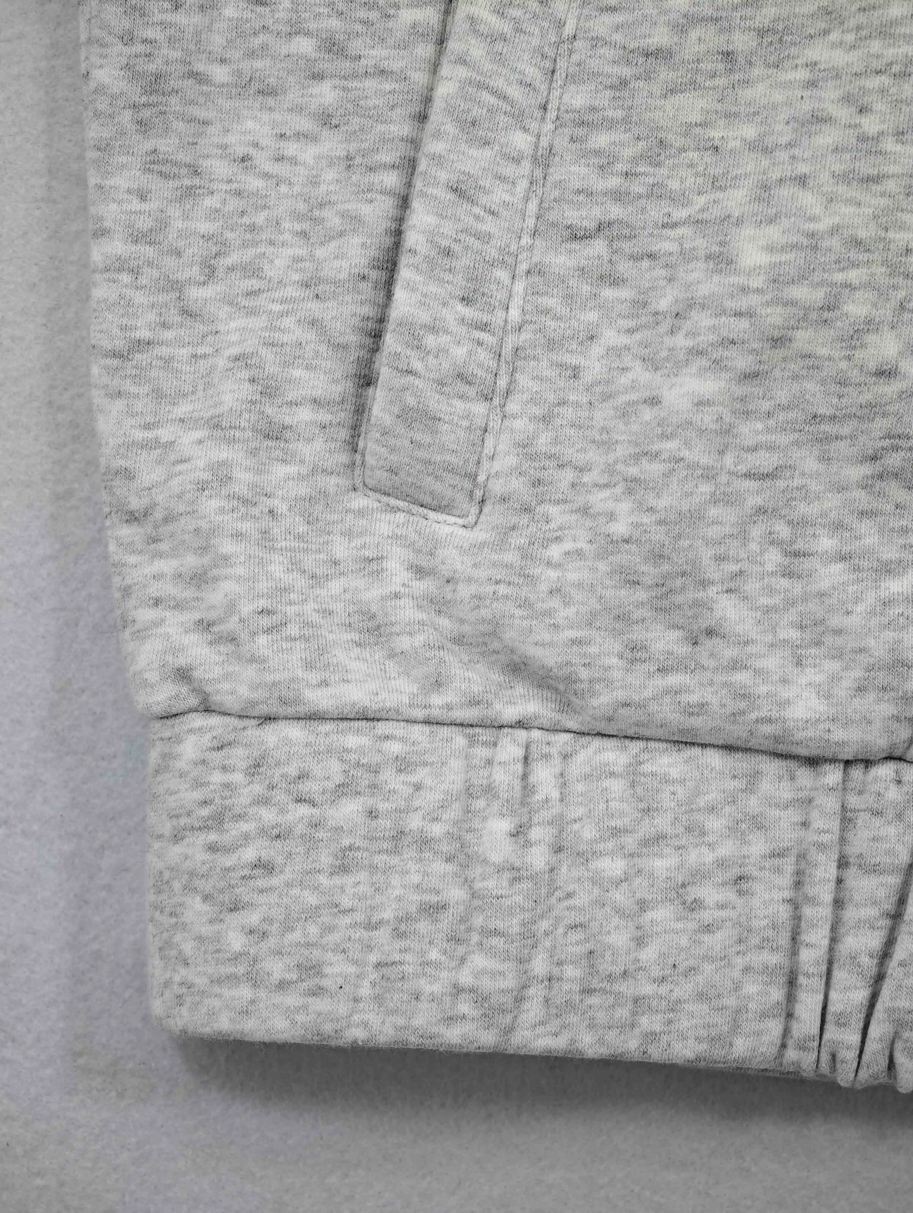 Side-entry pocket and reinforced opening construction
