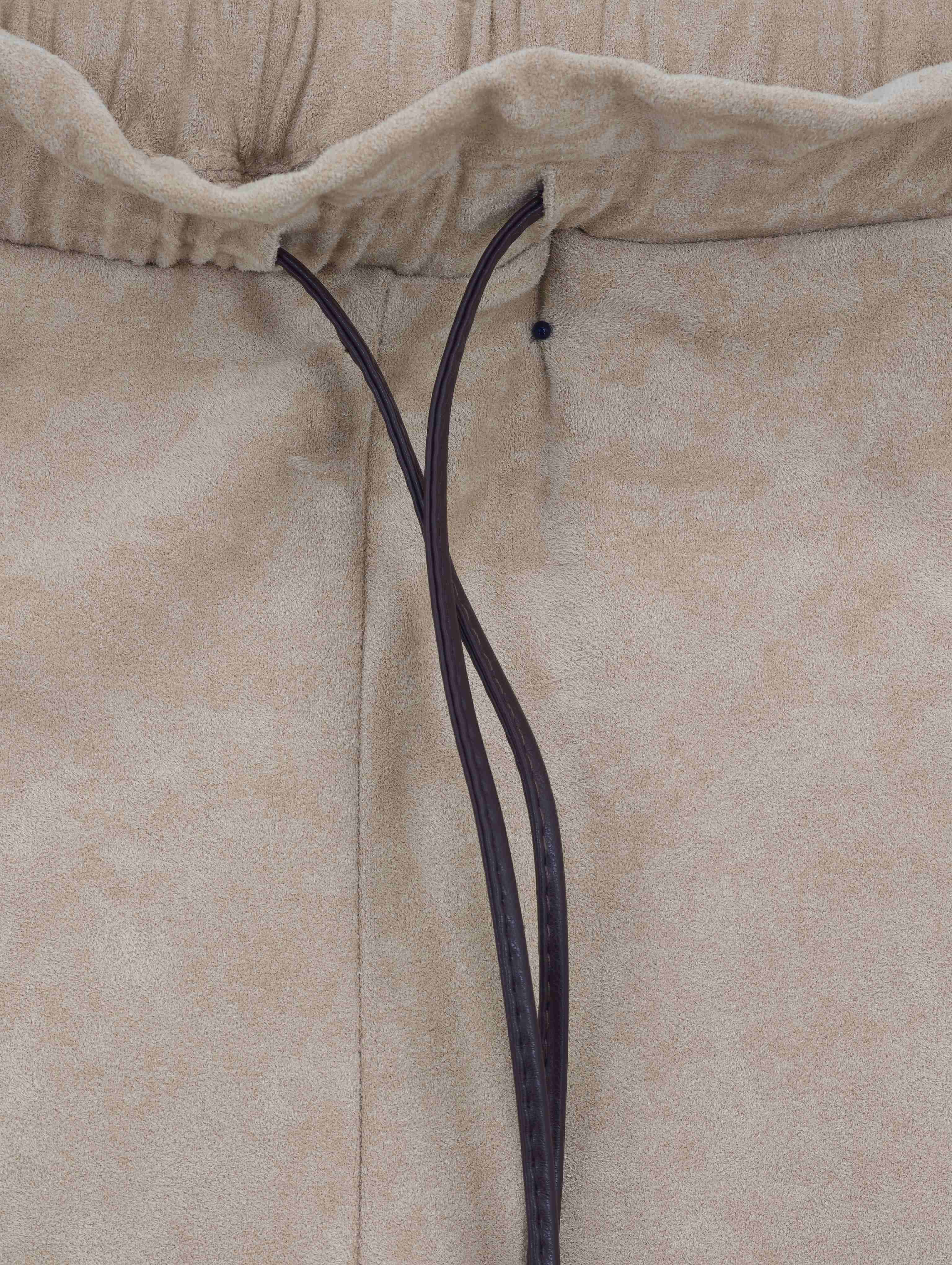 Contrast drawcord with gathered elastic waist close-up