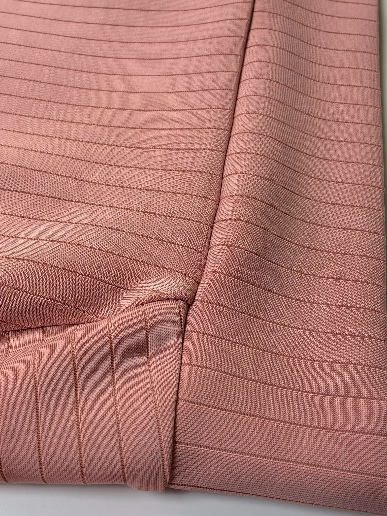 Sand-washed texture with reinforced pocket seam detail