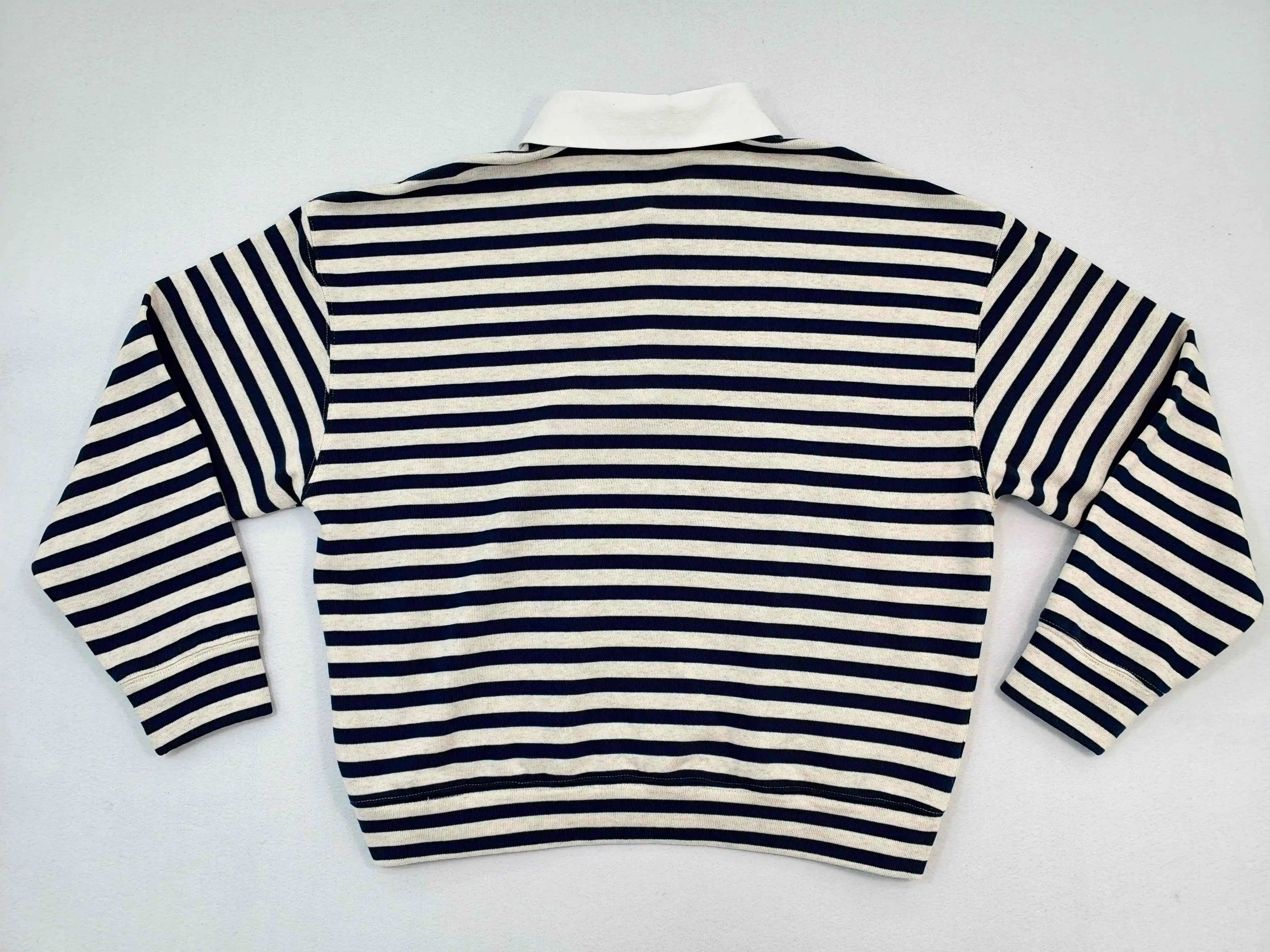 Back flat view with dropped shoulders and straight hem