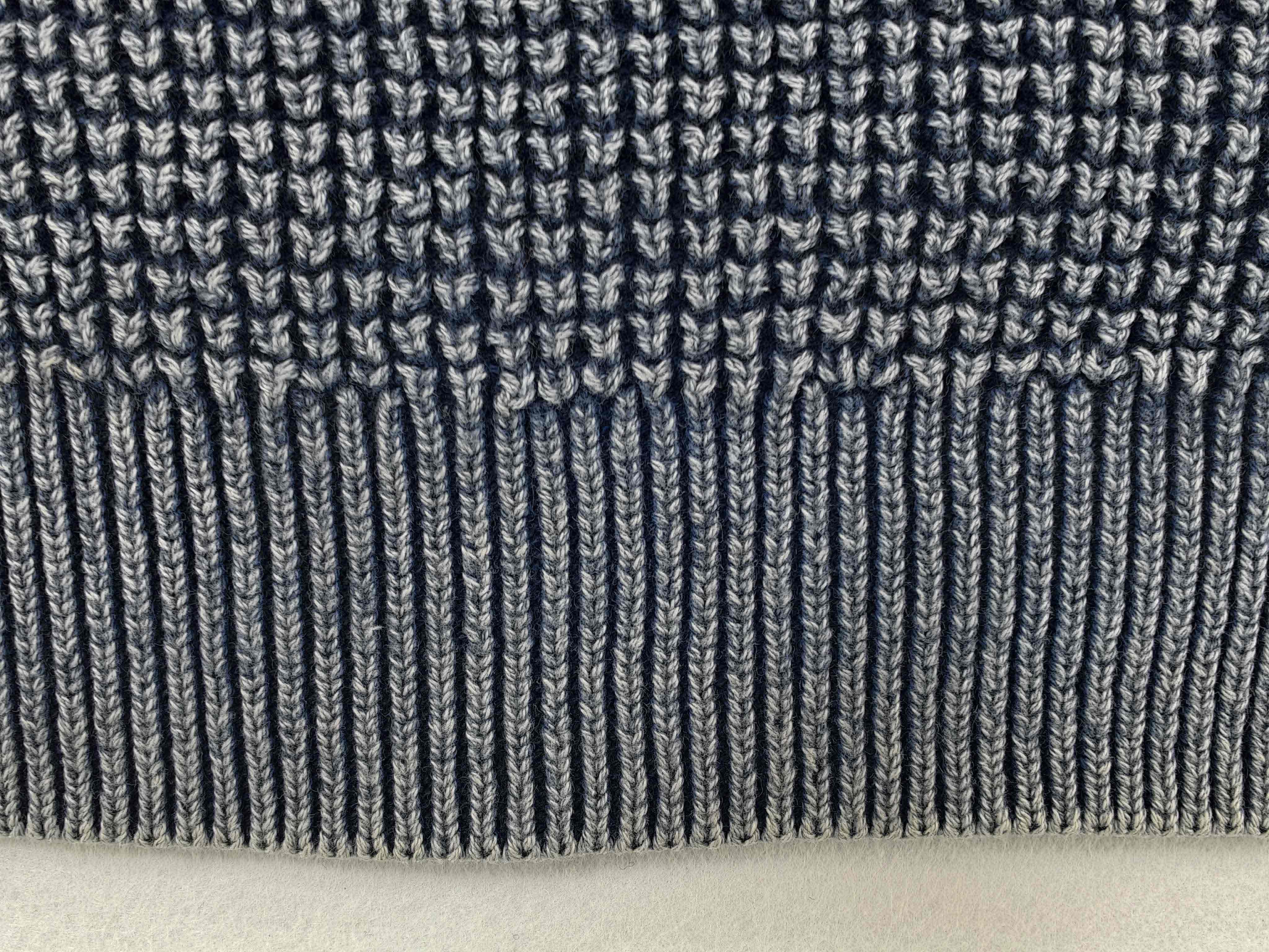 Textured cotton stitch beside wide rib trim