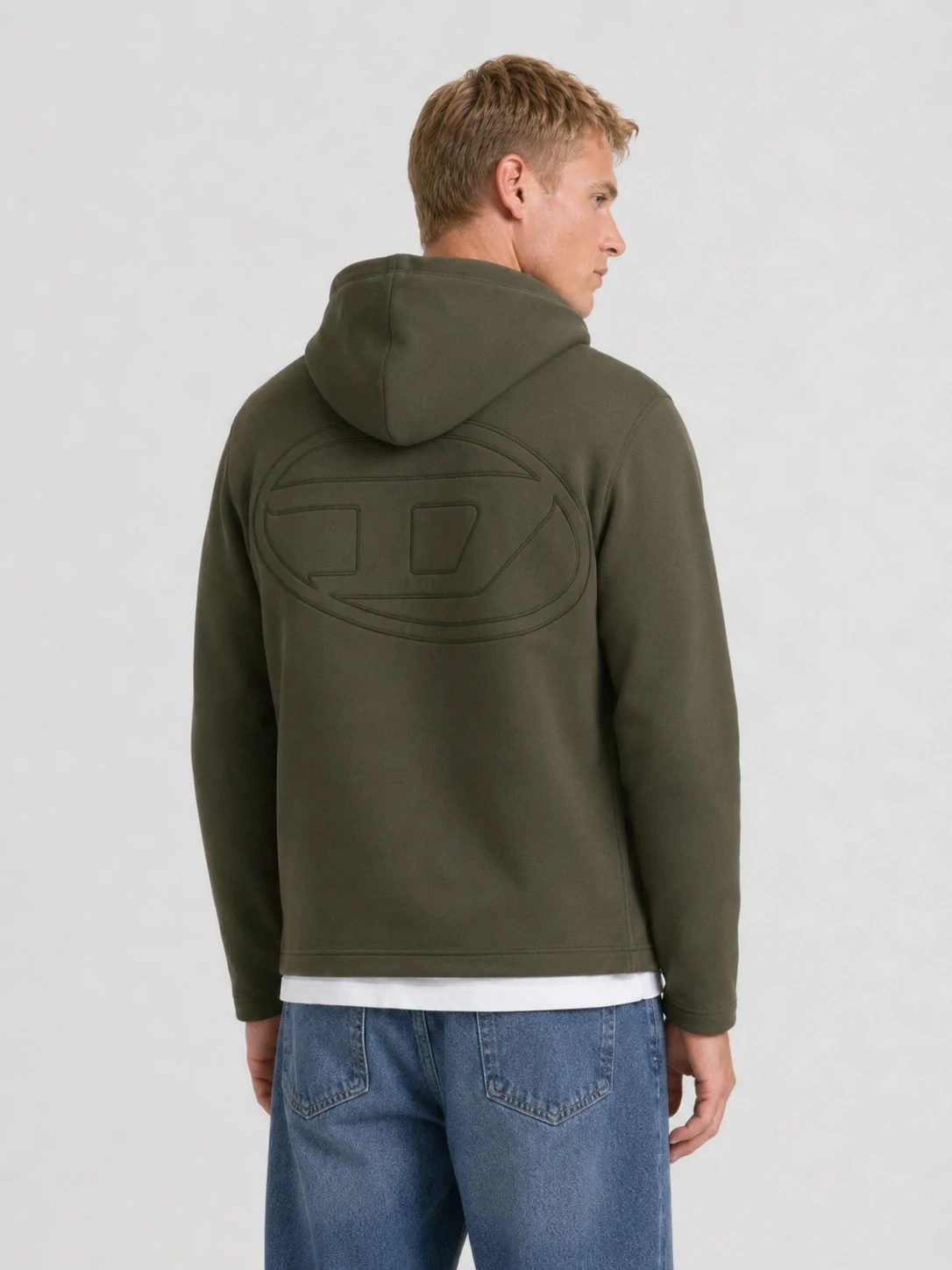 Back view with oversized tonal embroidered logo detail