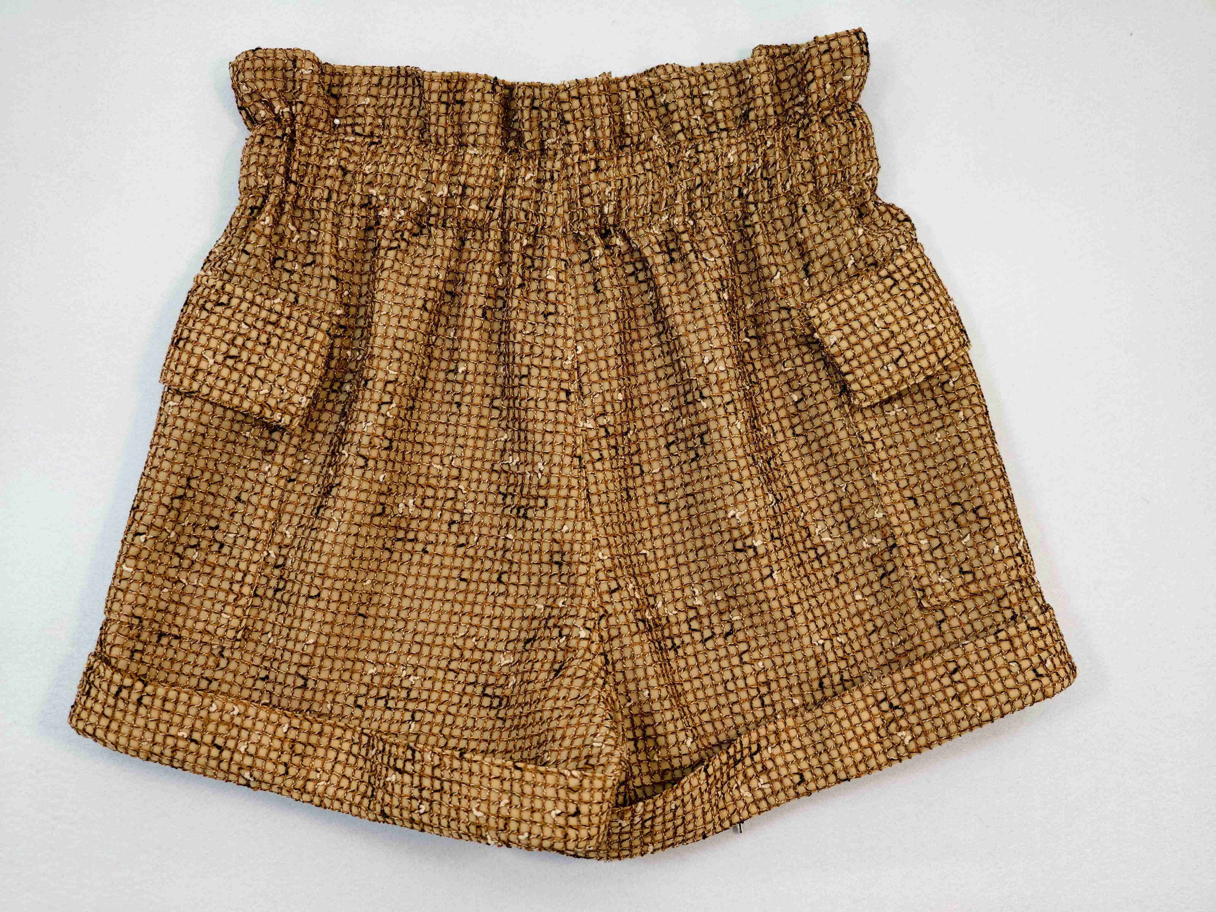 Rear view showing gathered waist and relaxed short shape