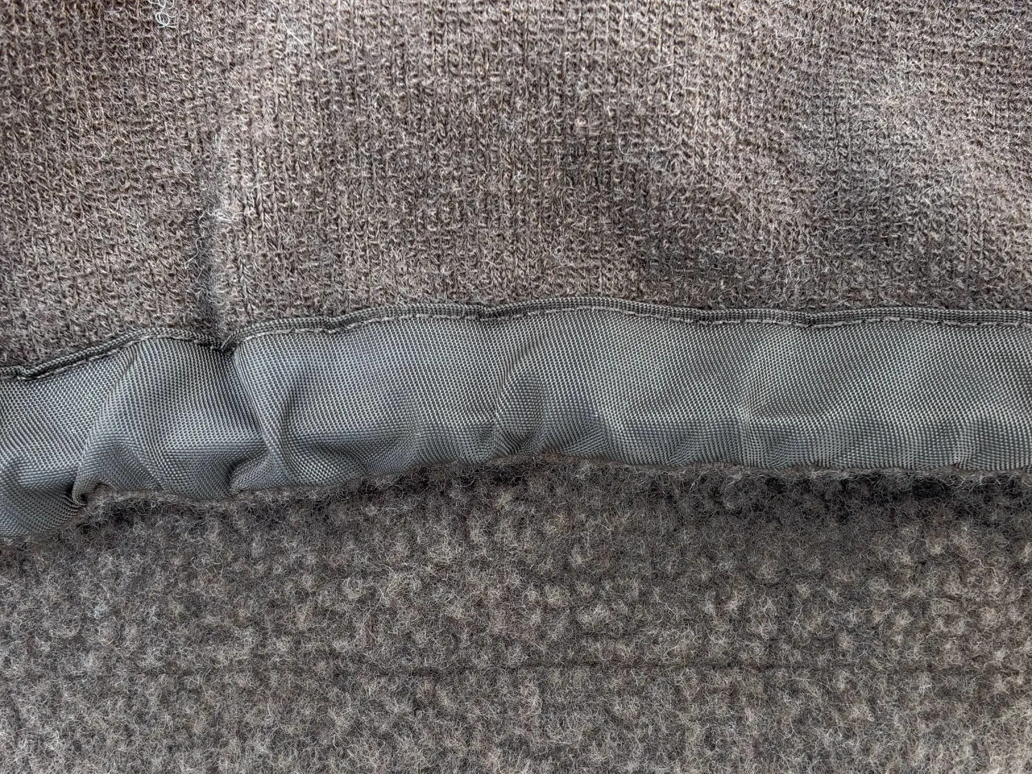 Fleece interior and adjustable hem finishing detail