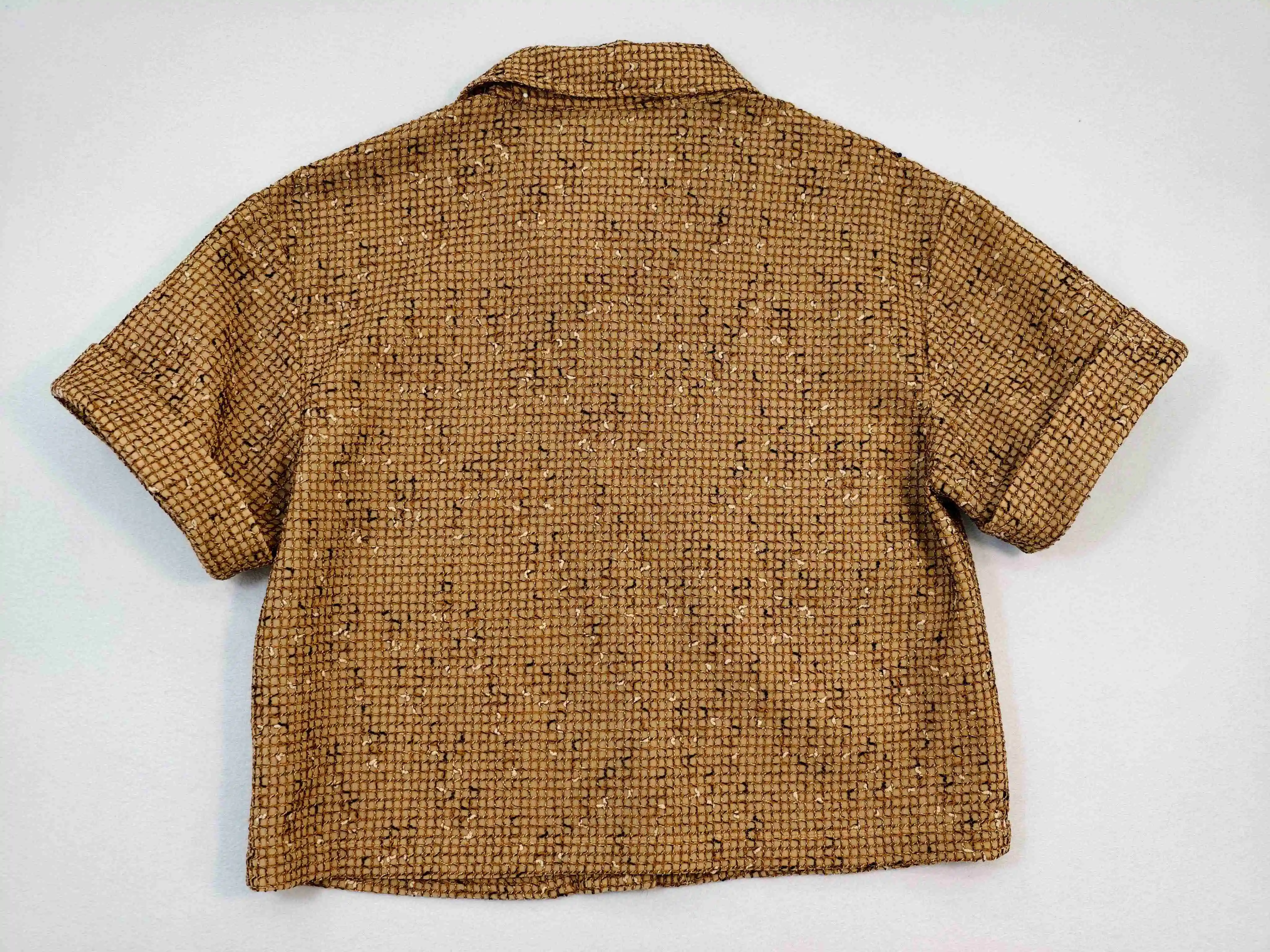 Structured bonded fabric back panel for apparel brands