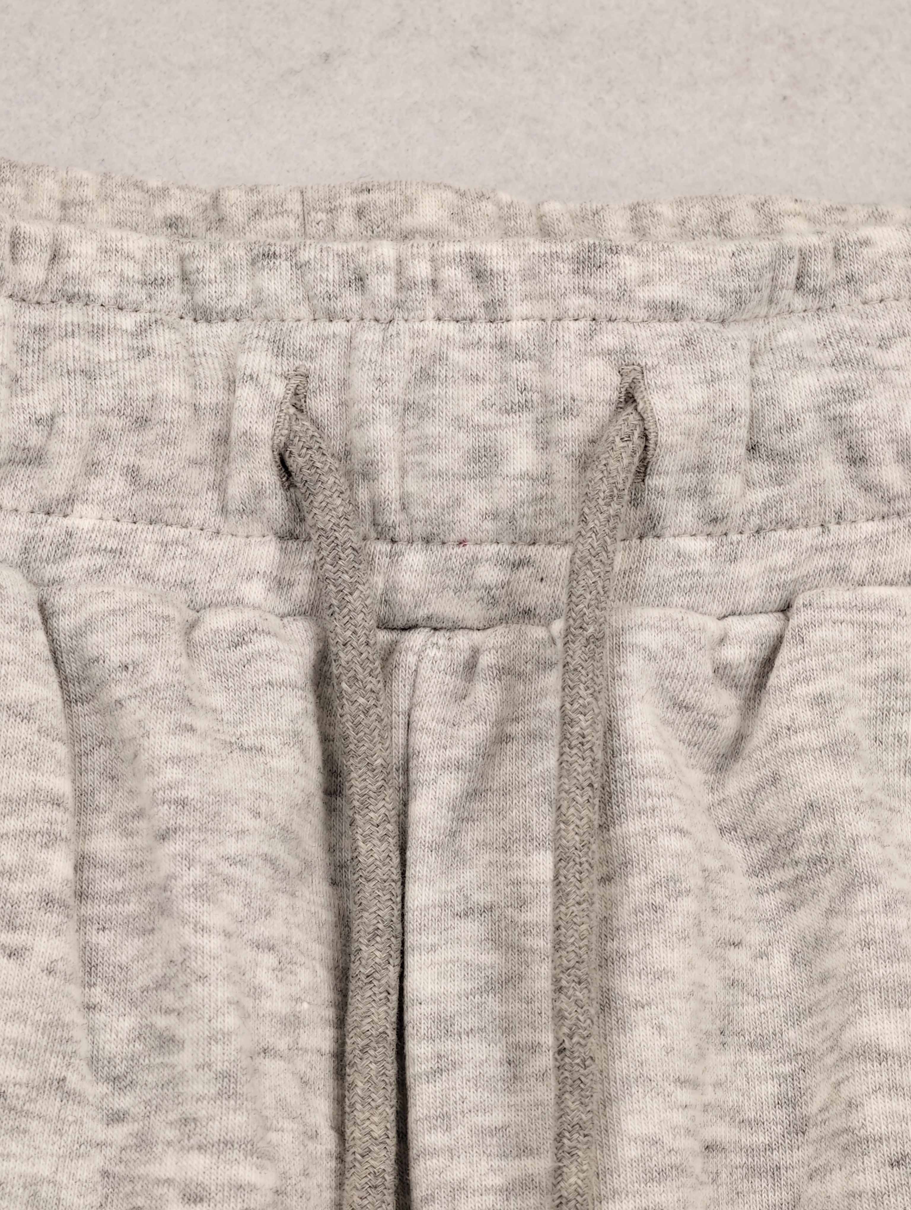 Tonal drawcord and gathered waistband construction close-up