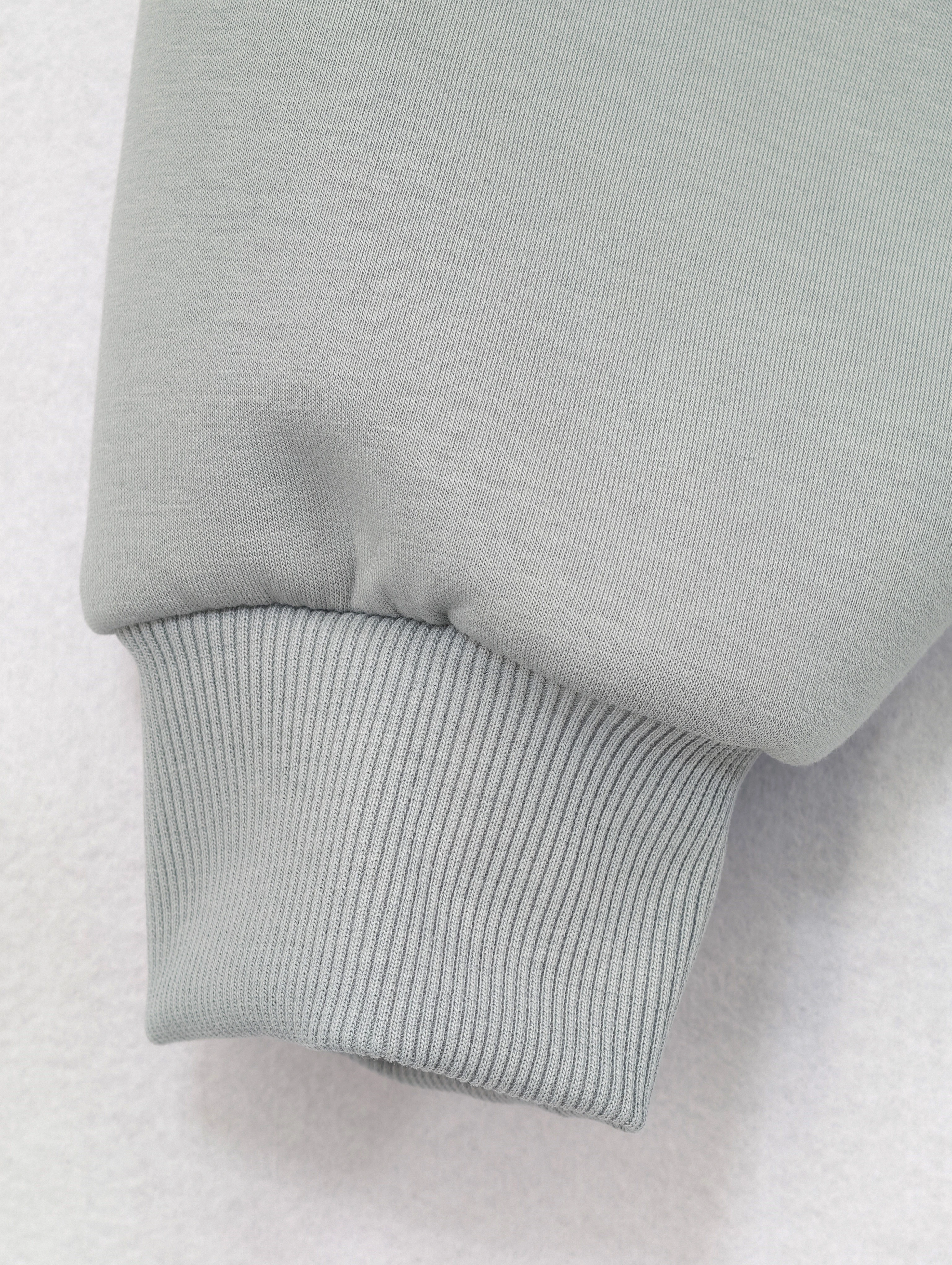 Brushed-scuba sleeve with structured ribbed cuff detail