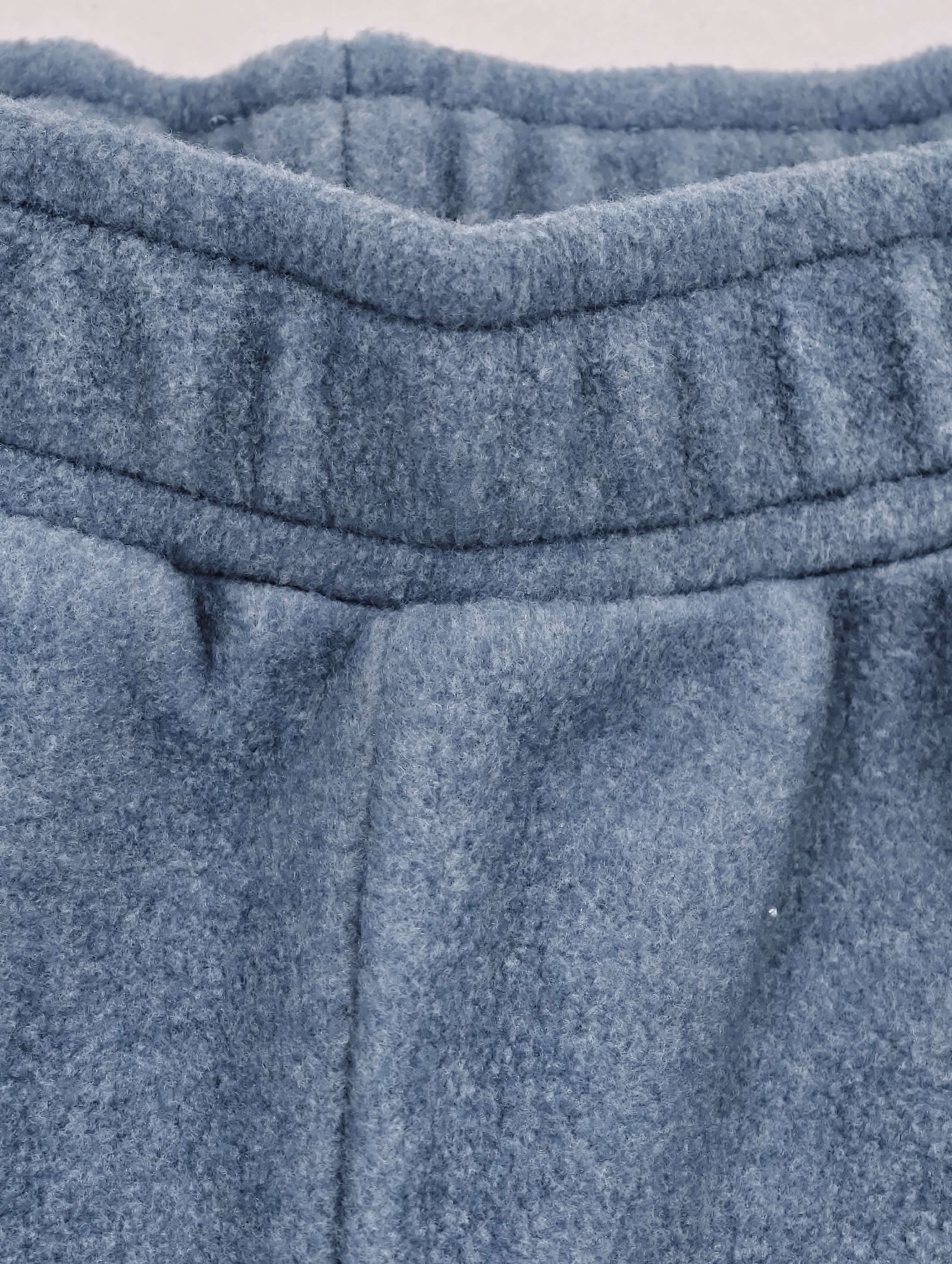 Multi-row elastic waistband with gathered fleece finish