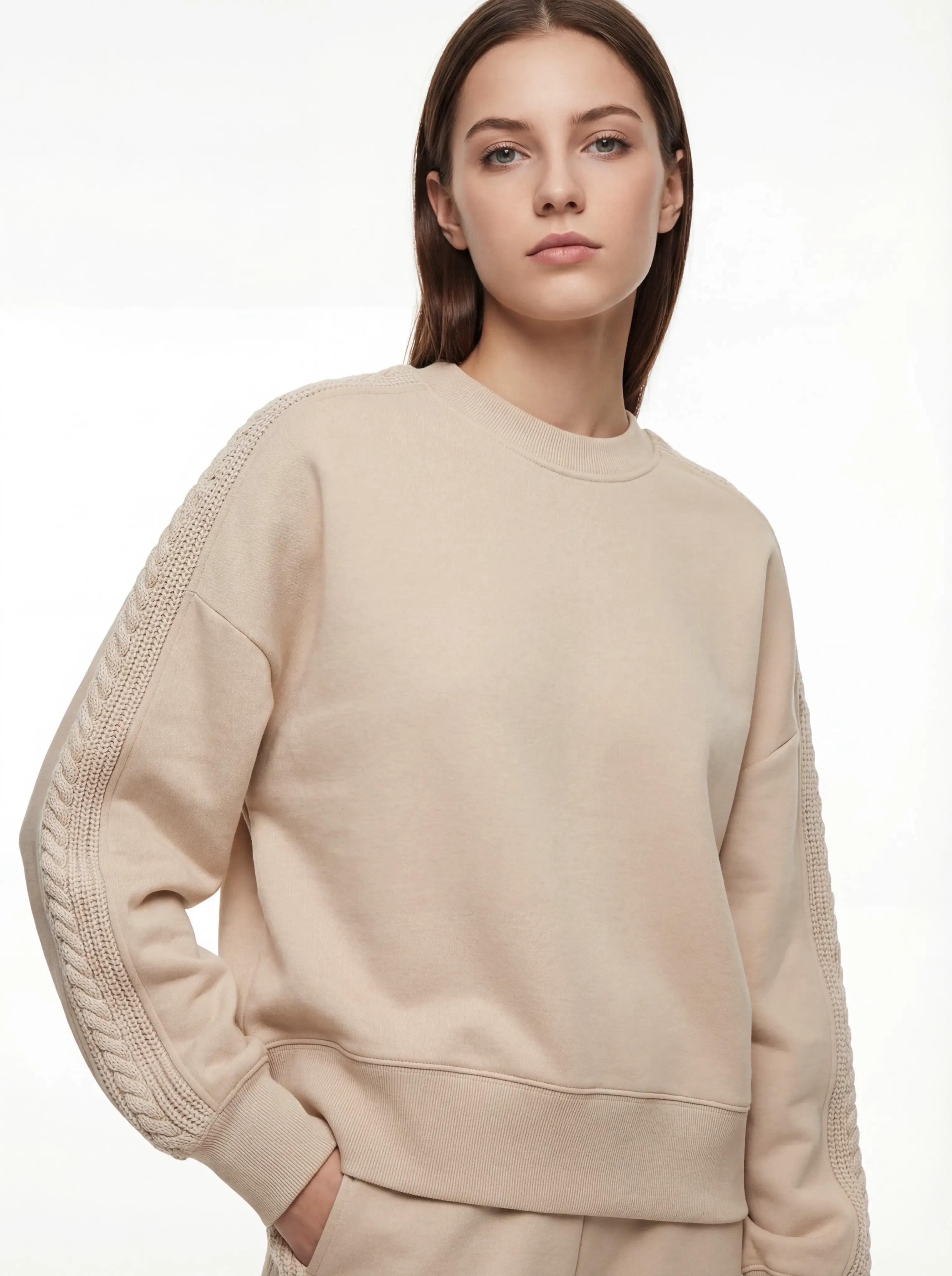 Peach-brushed sweatshirt front with cable-knit sleeve inserts