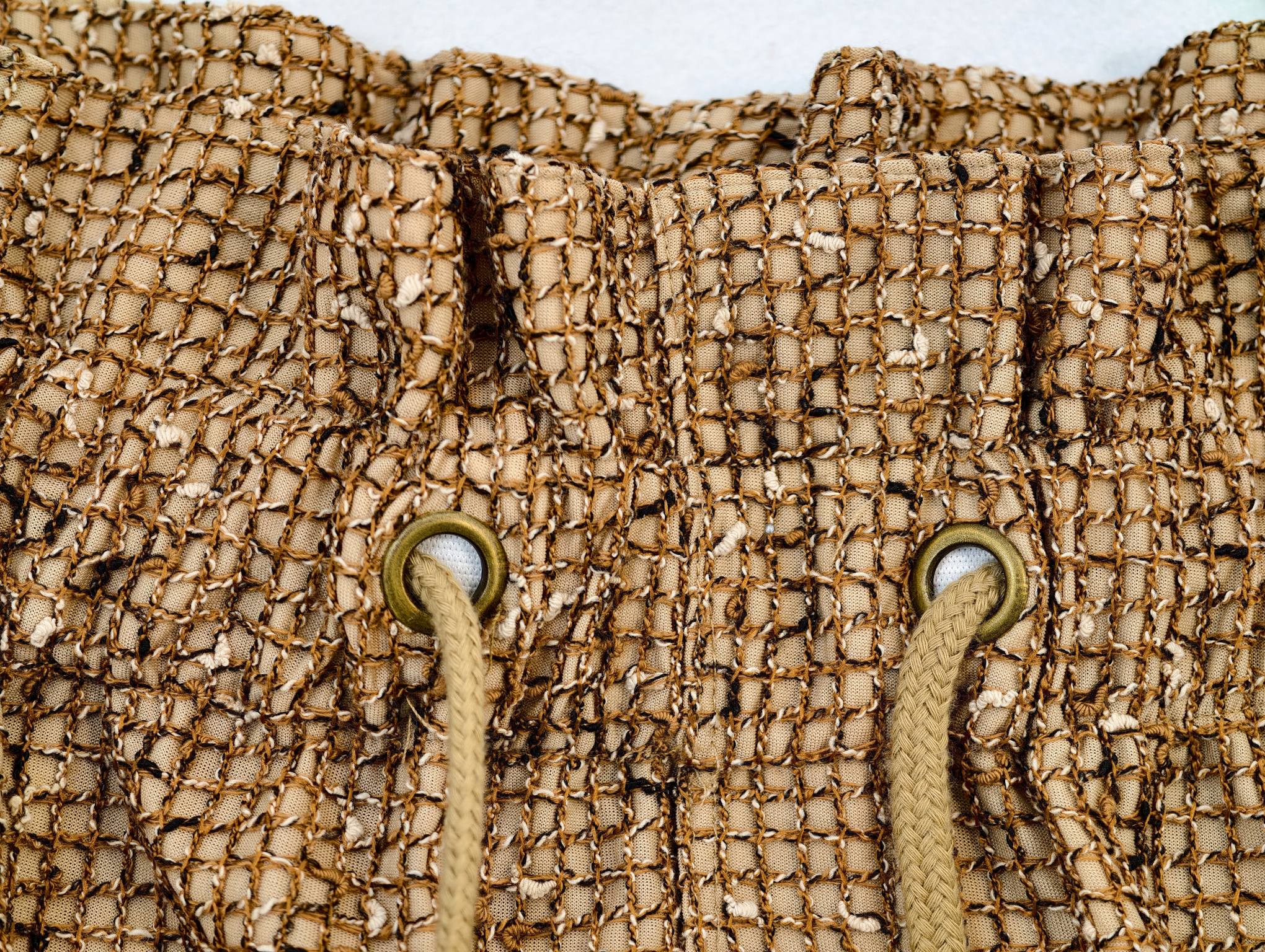 Reinforced eyelets and waistband casing for private label development