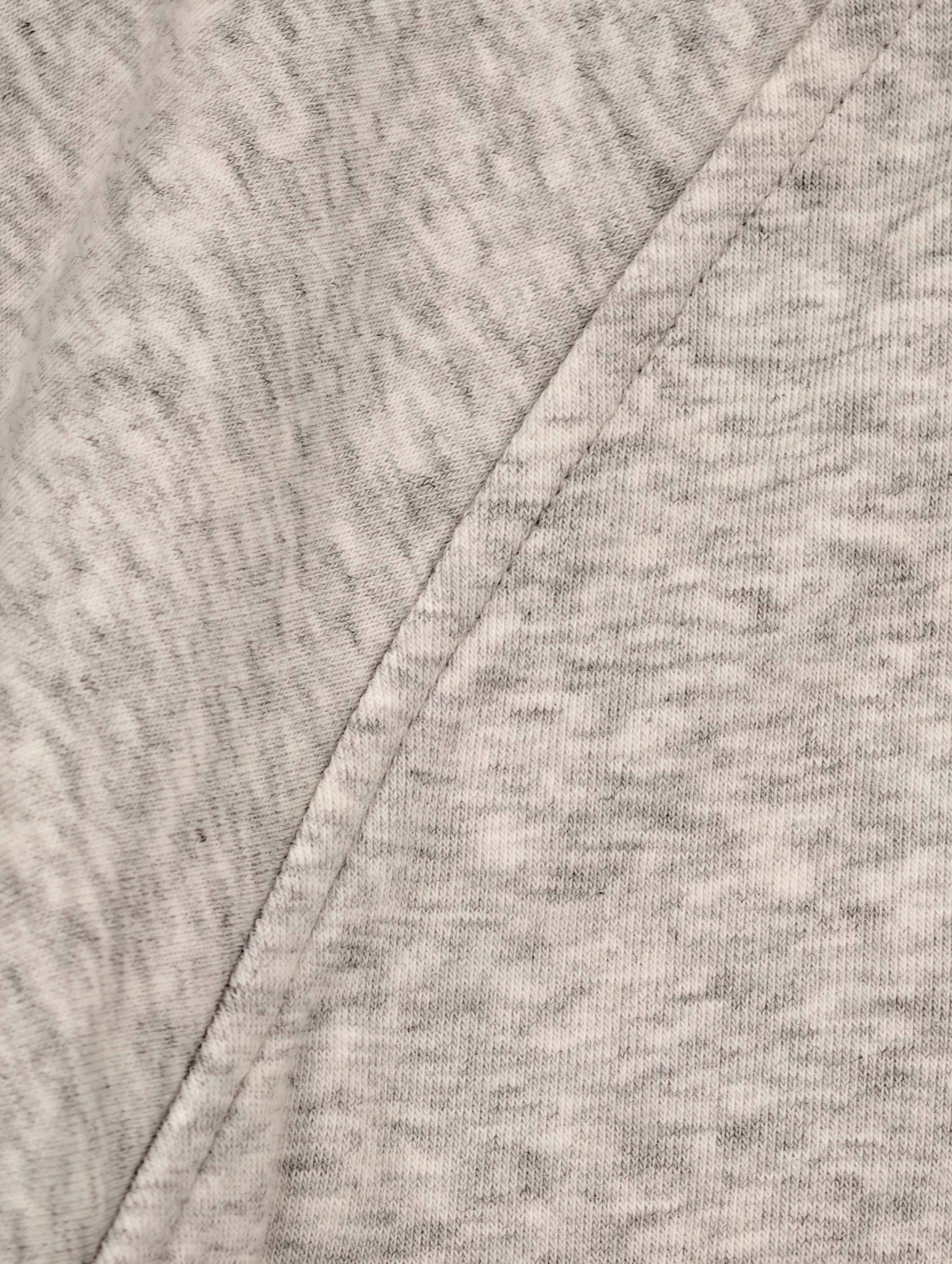 Raglan sleeve seam with clean reinforced stitching