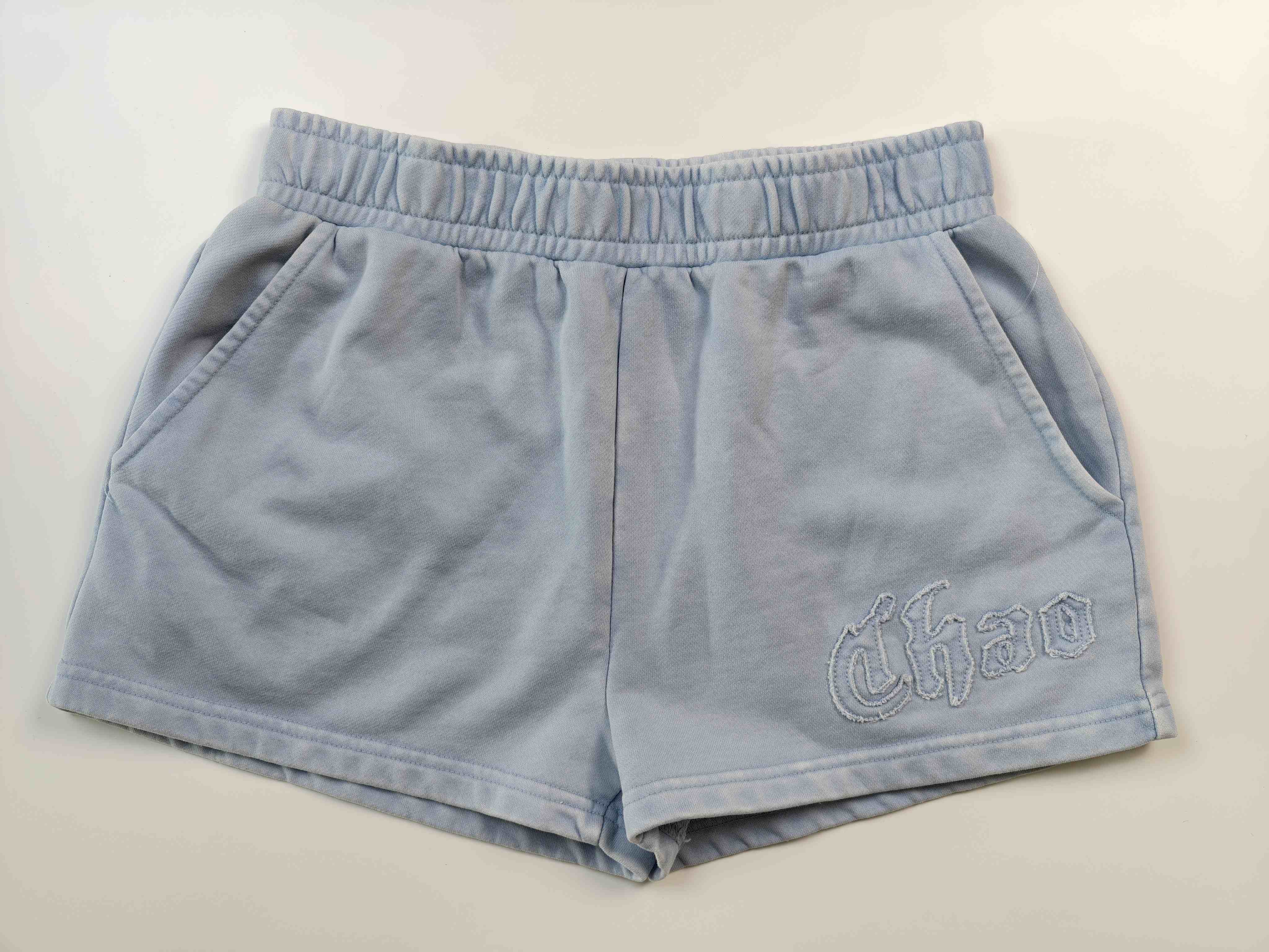Back view of relaxed cotton sweat shorts with elastic waist
