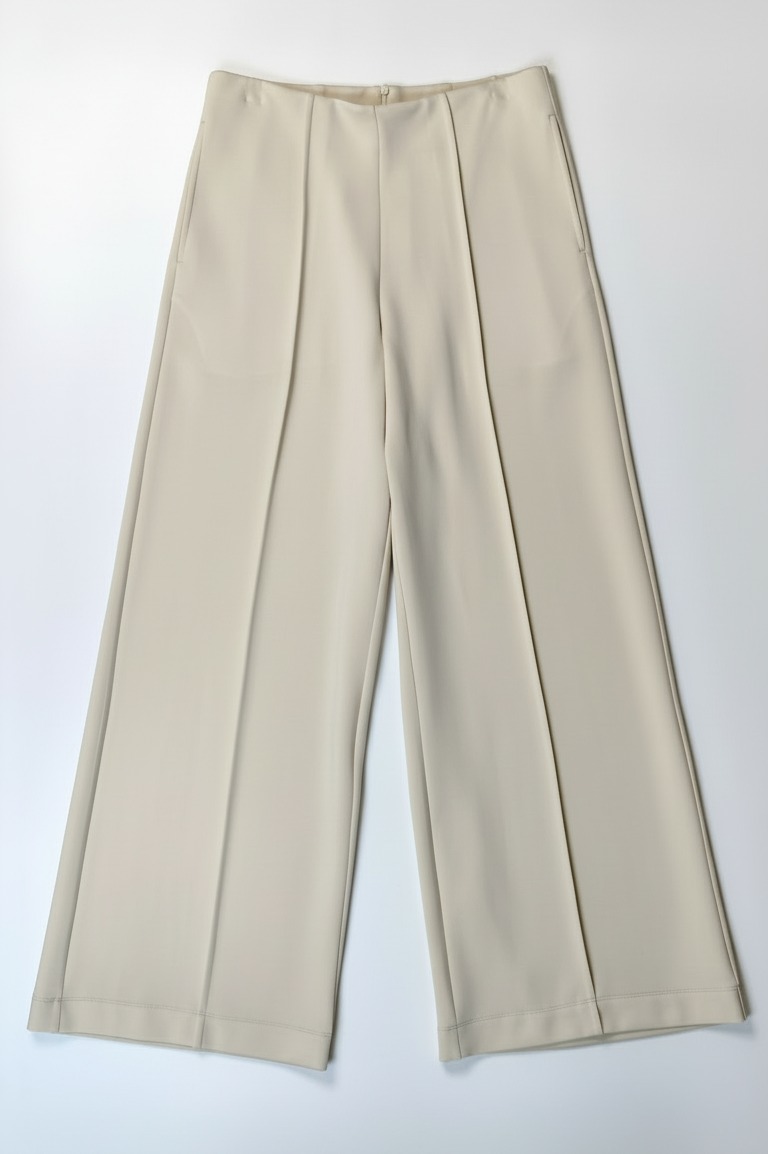 Wide-leg silhouette and clean hem construction detail