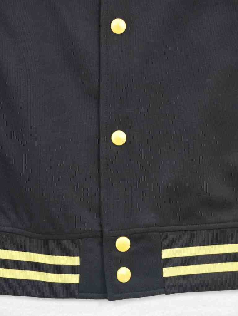 Gold snap placket with yellow striped rib hem finish