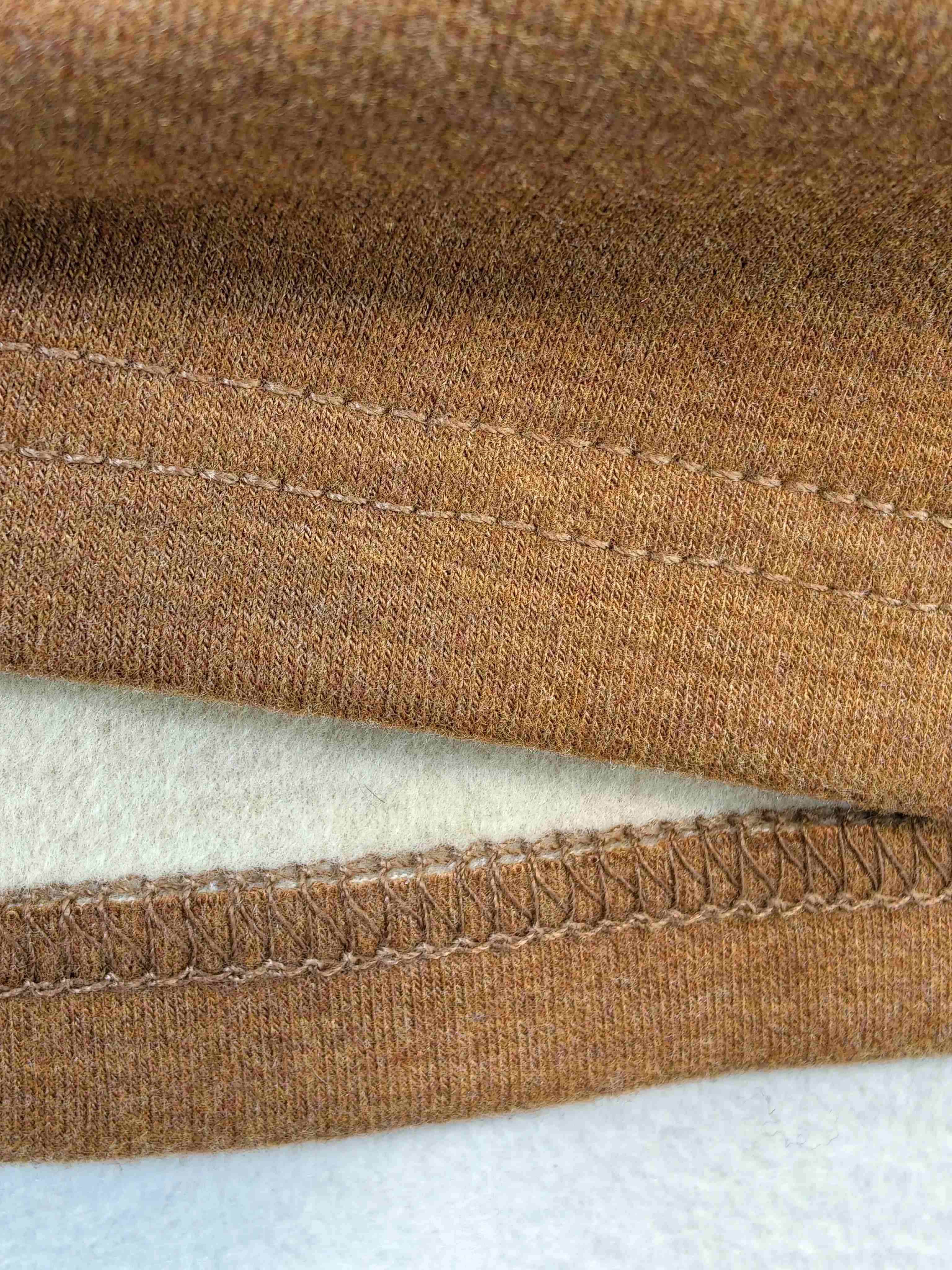 Soft brushed fleece fabric with clean stitched hem