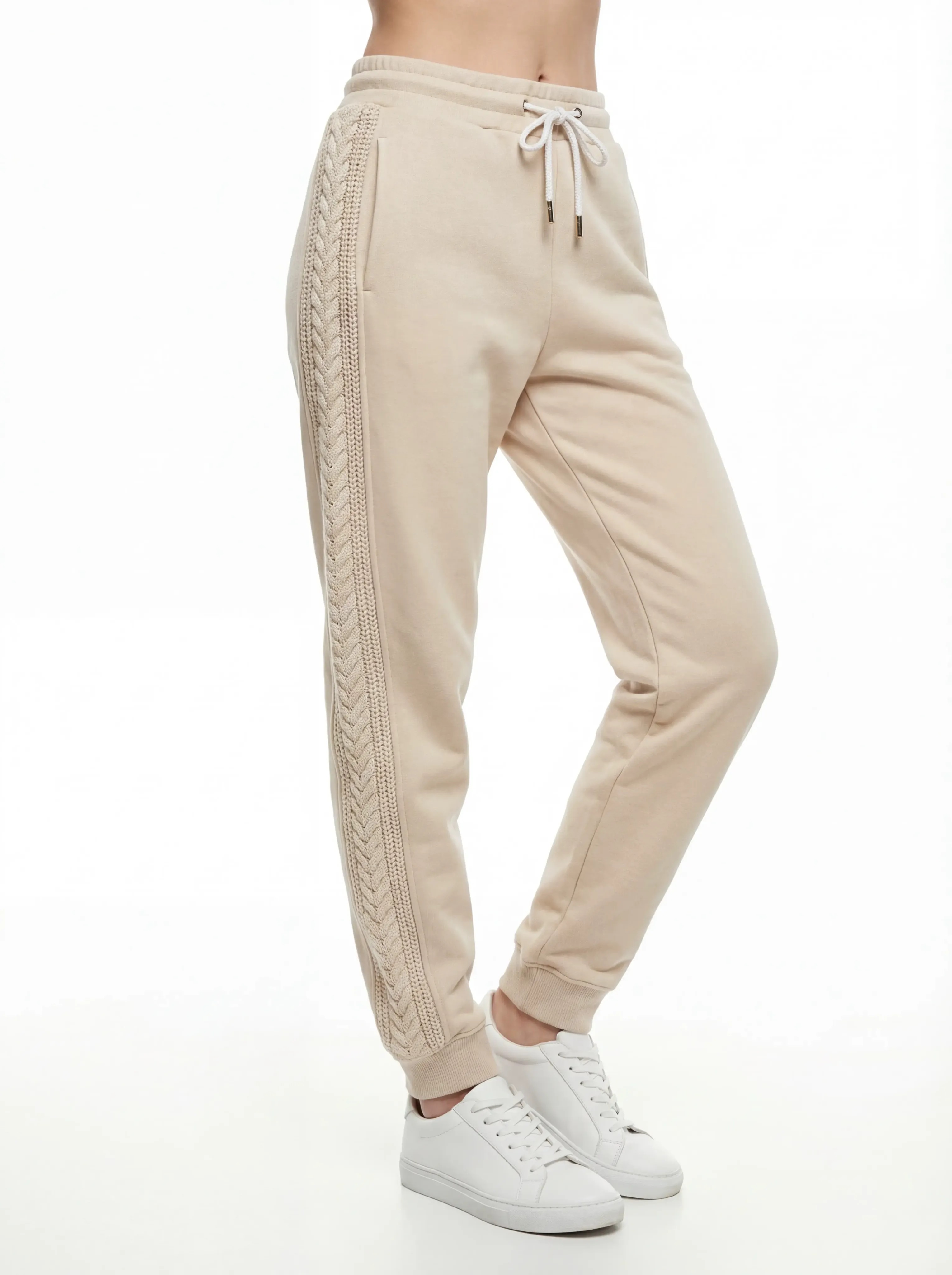 Women’s peach brushed fleece jogger pants with cable-knit side panels