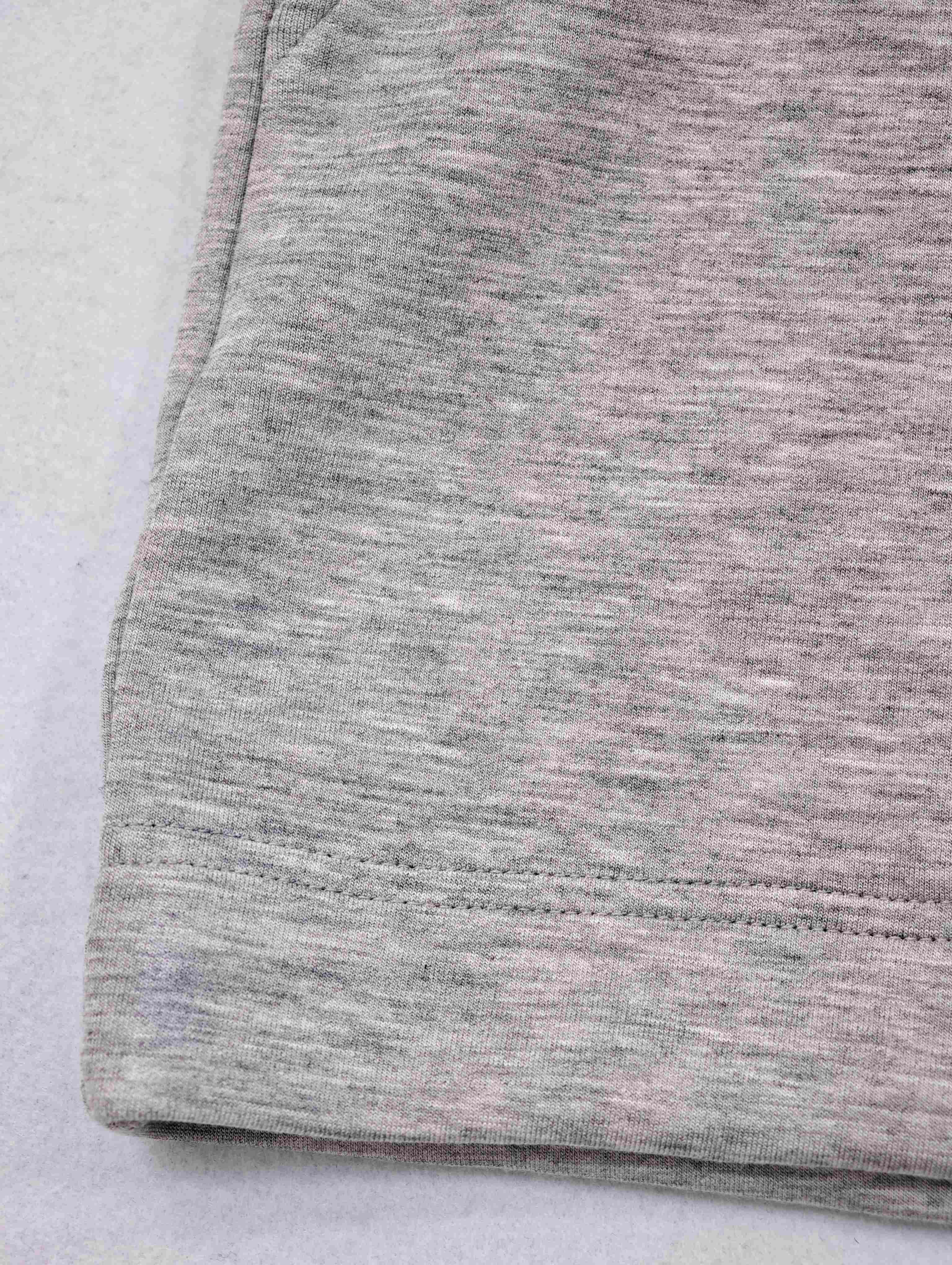 Heathered knit fabric with clean stitched hem finish