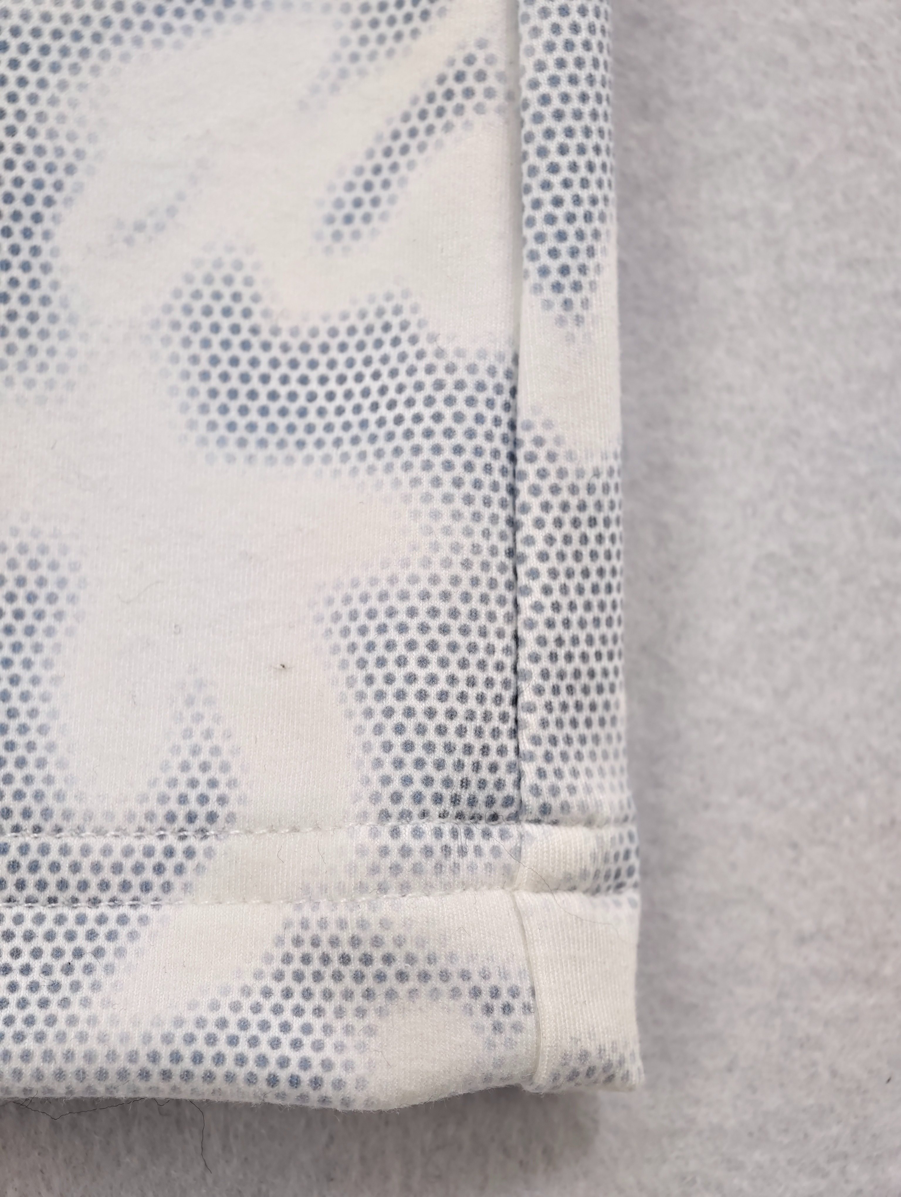 Side seam and printed hem construction detail
