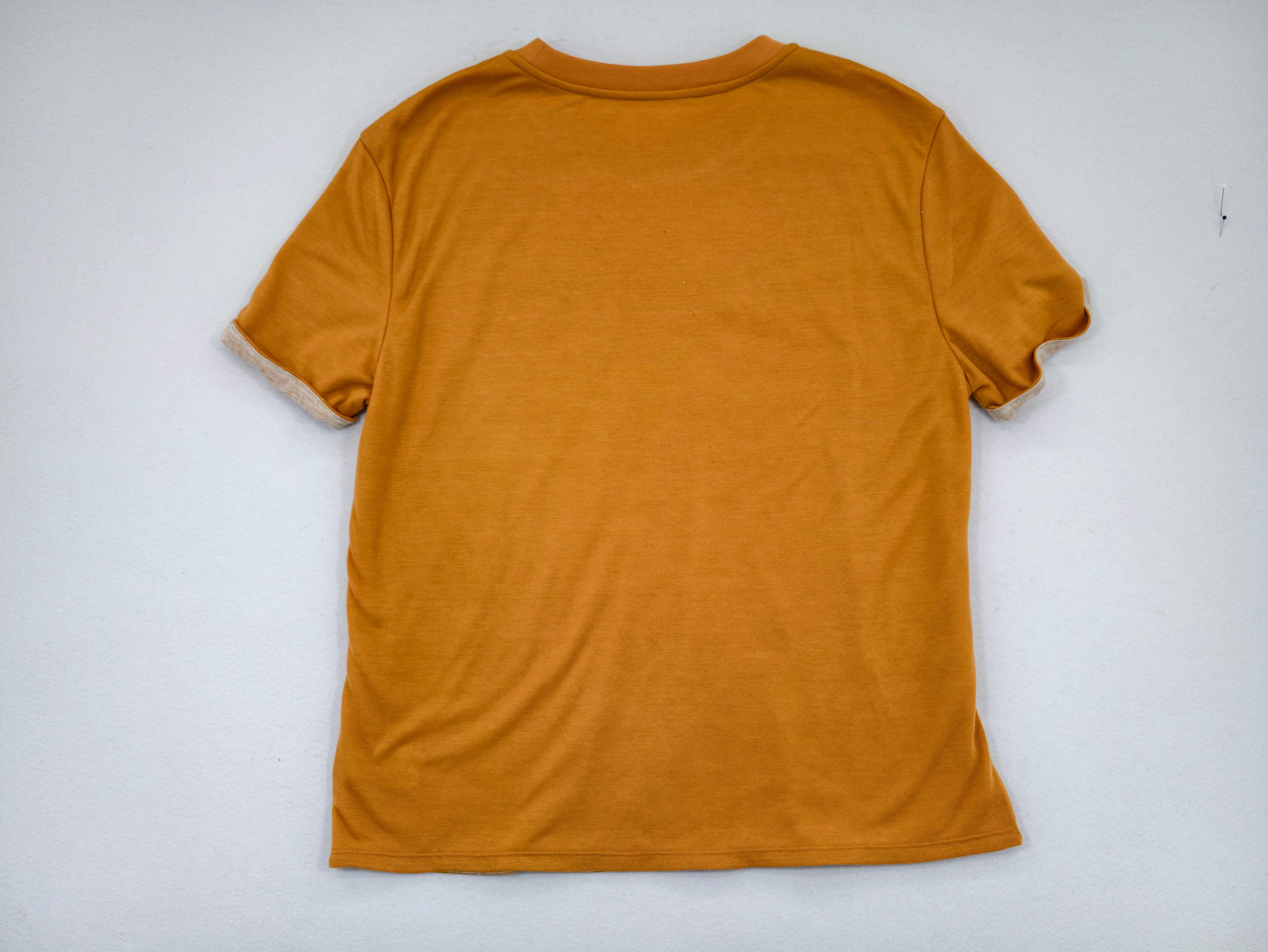 Plain back view showing loose straight silhouette