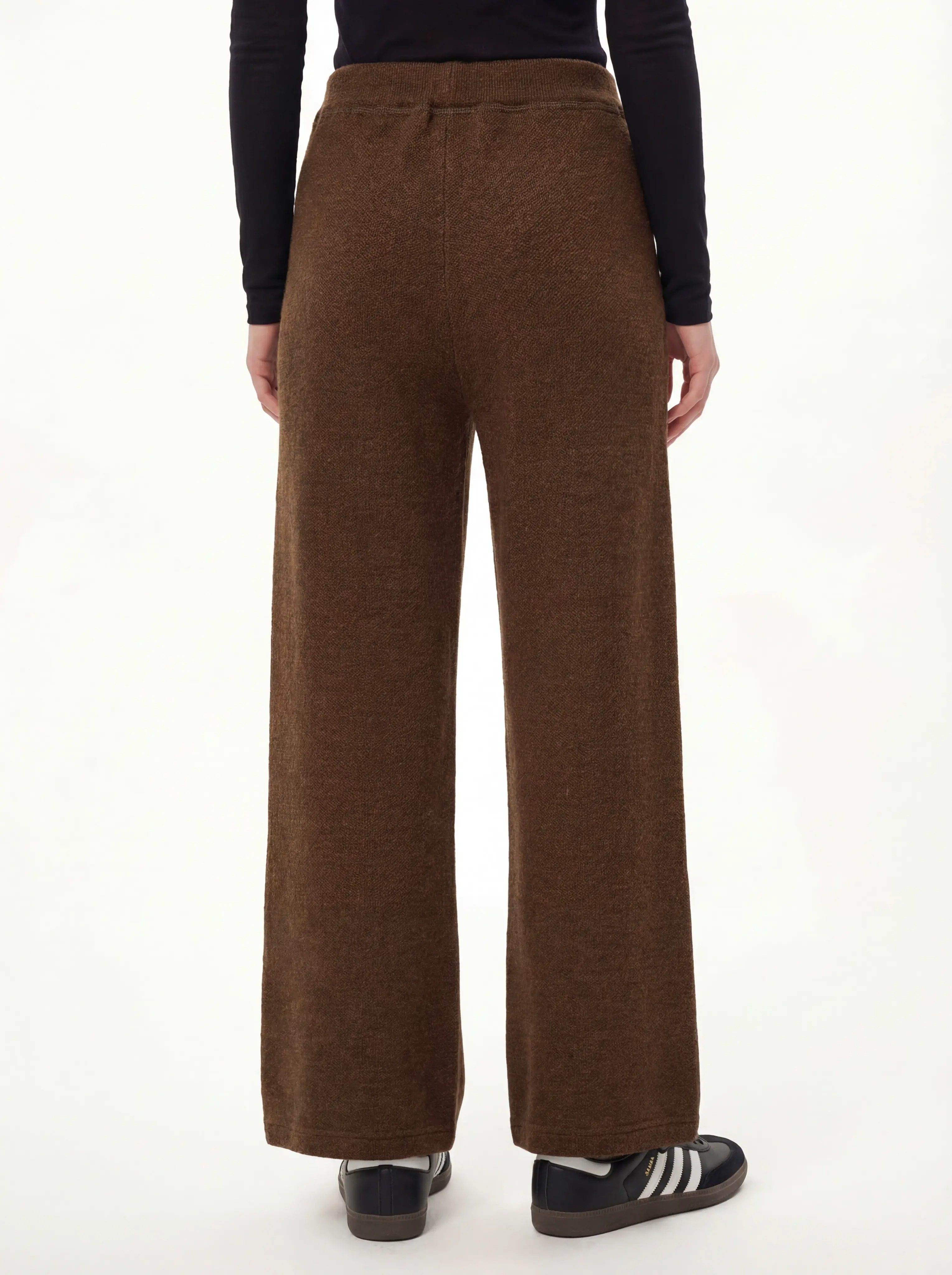 Back view with clean waistband and relaxed legs