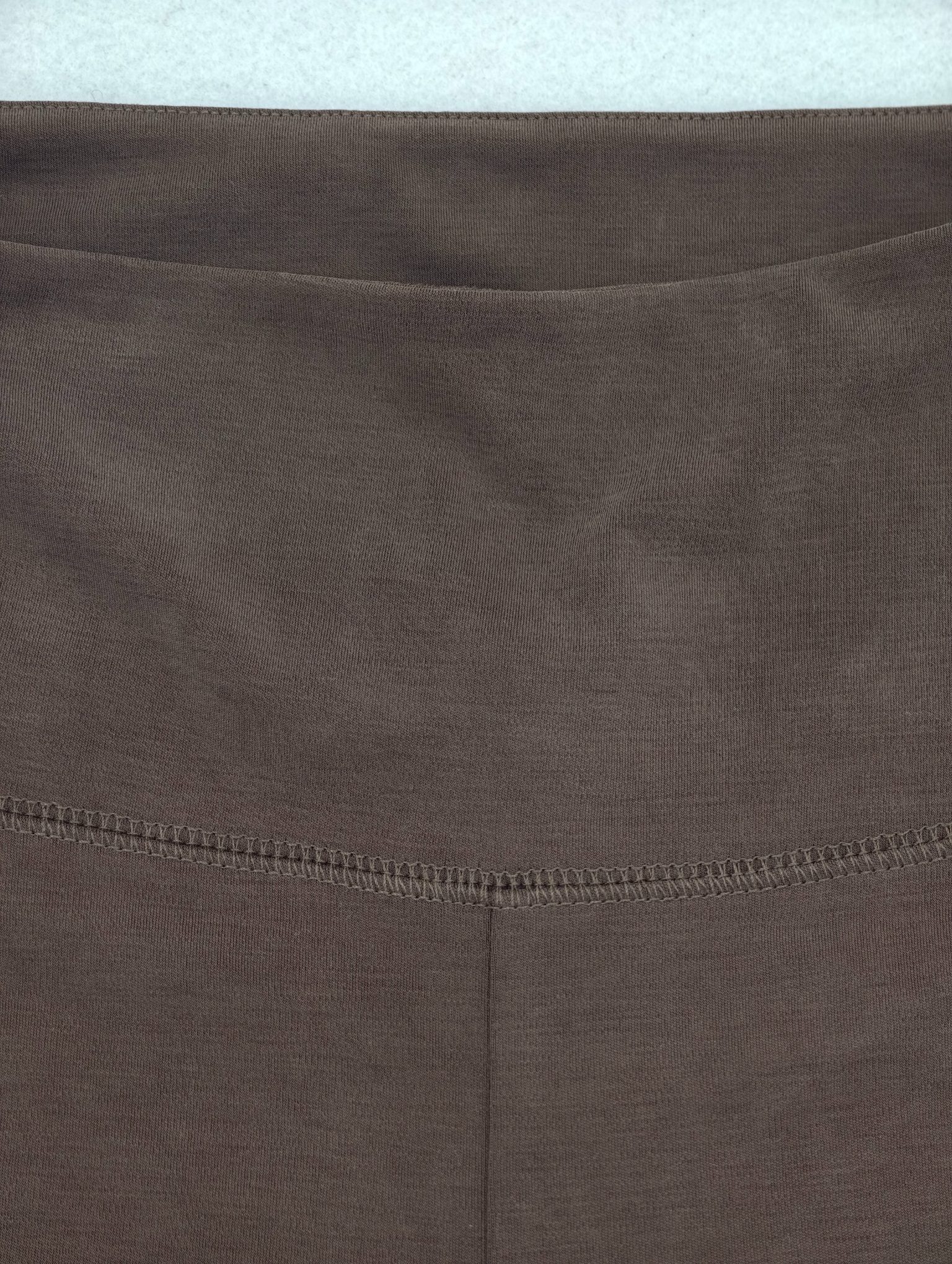 High-rise waistband and seam construction by a pants supplier