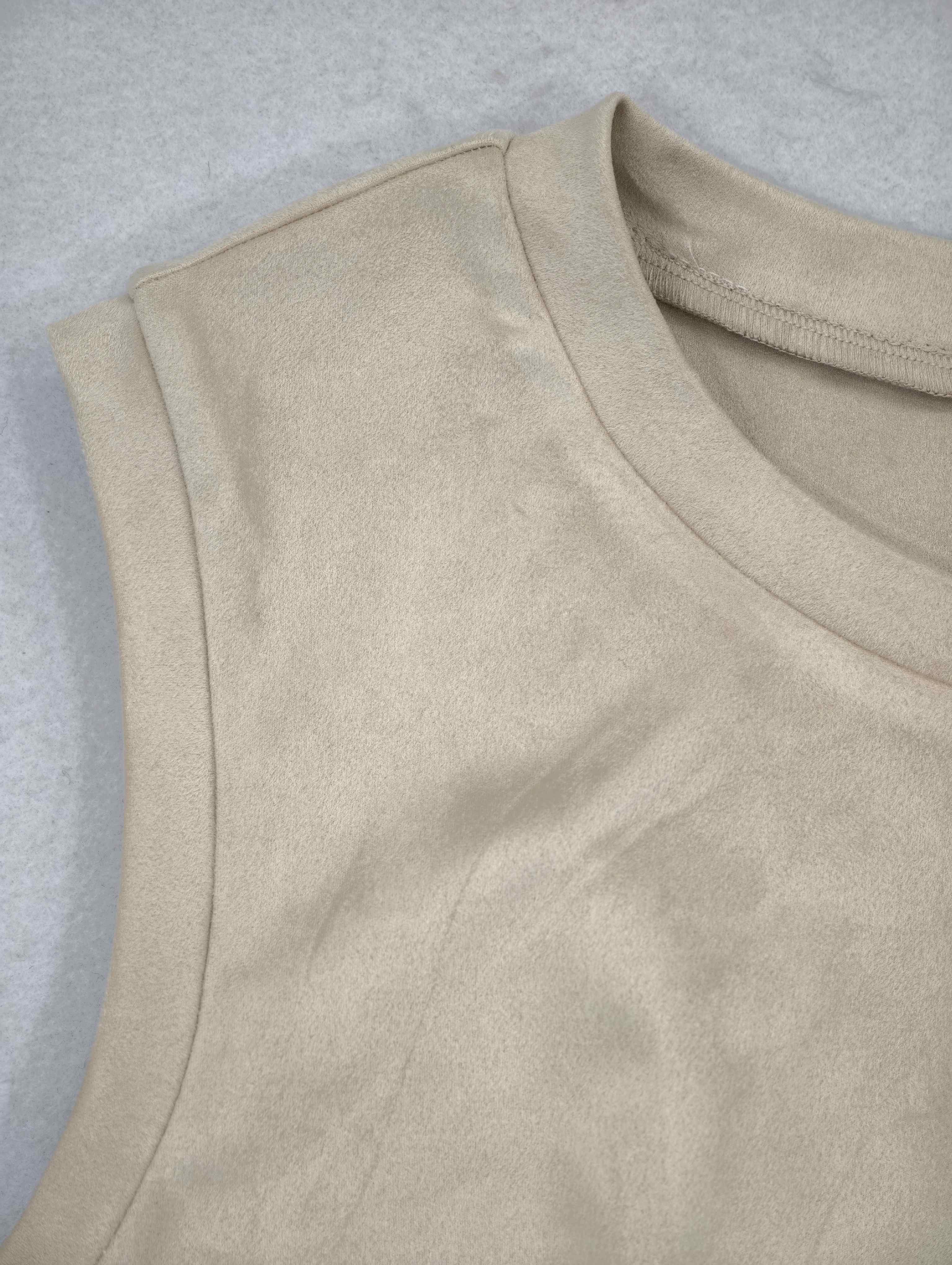 Round neckline and armhole finish by a dress manufacturer