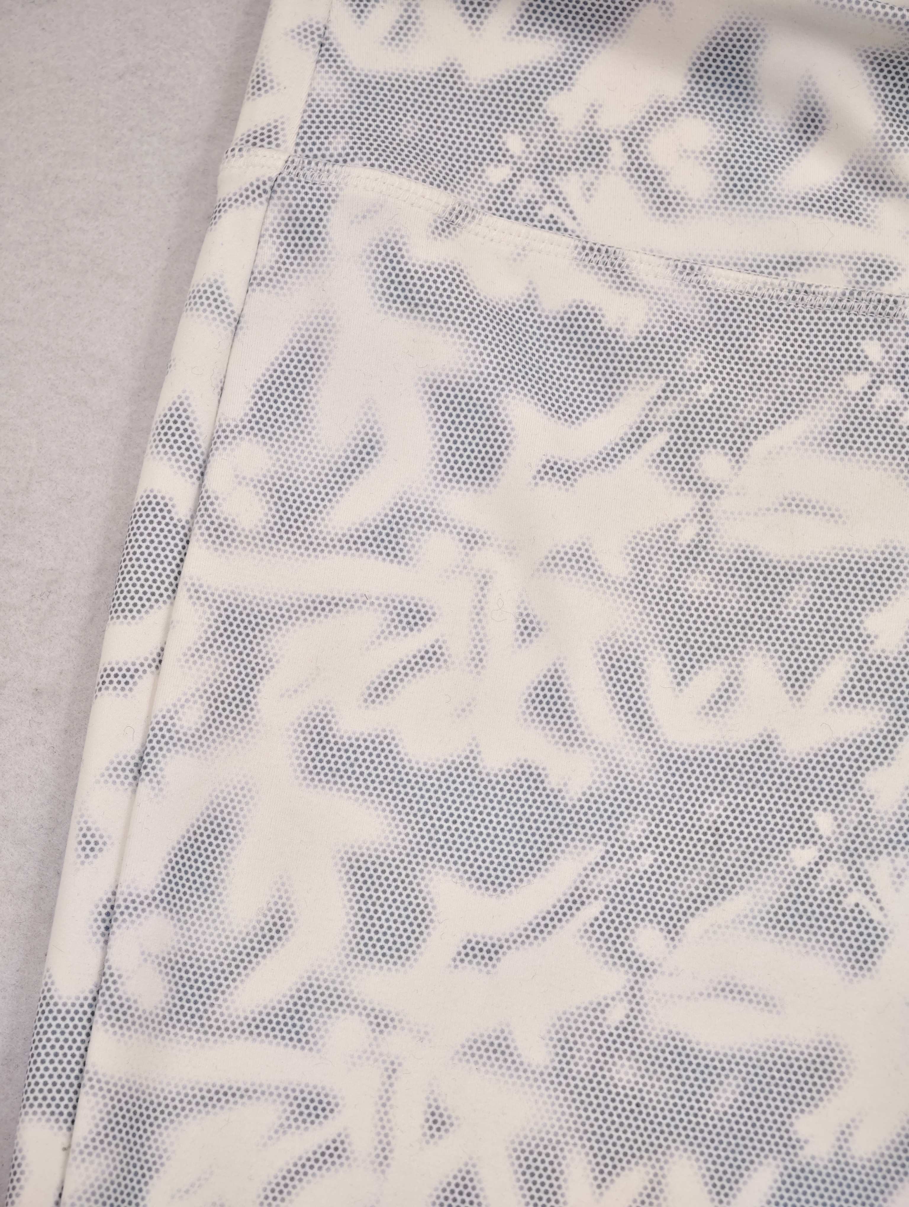 Close-up of abstract print on stretch leggings fabric