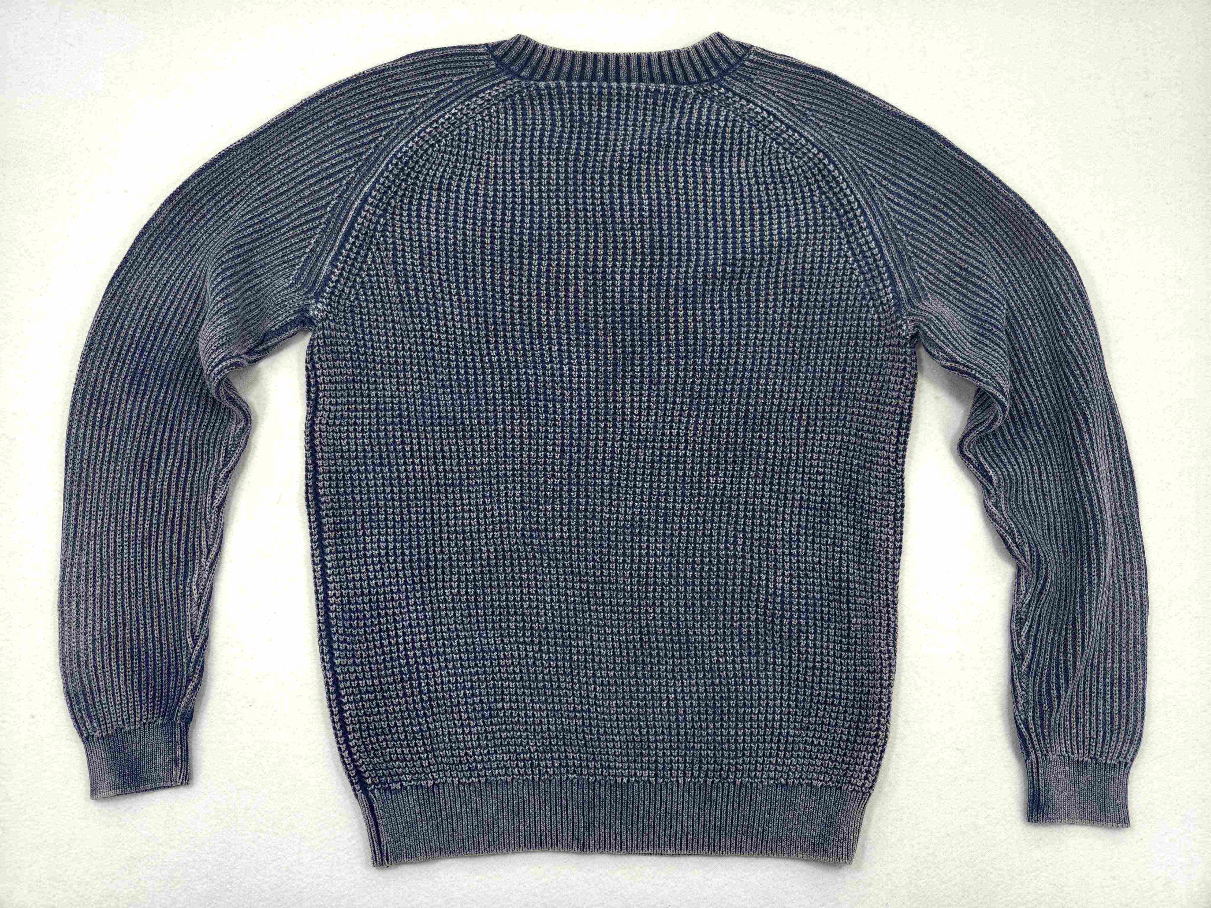 Raglan back knit finished with ribbed hem