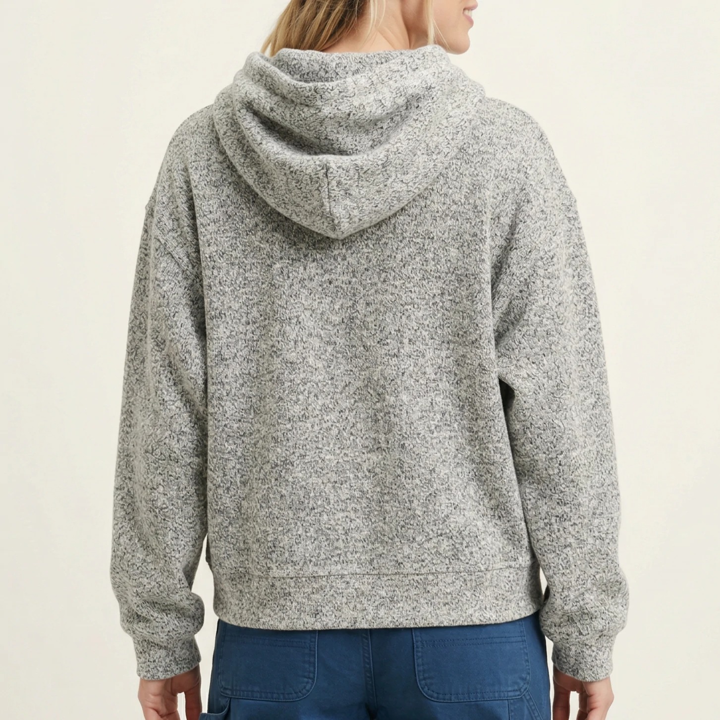 Back view with relaxed hood and dropped shoulders