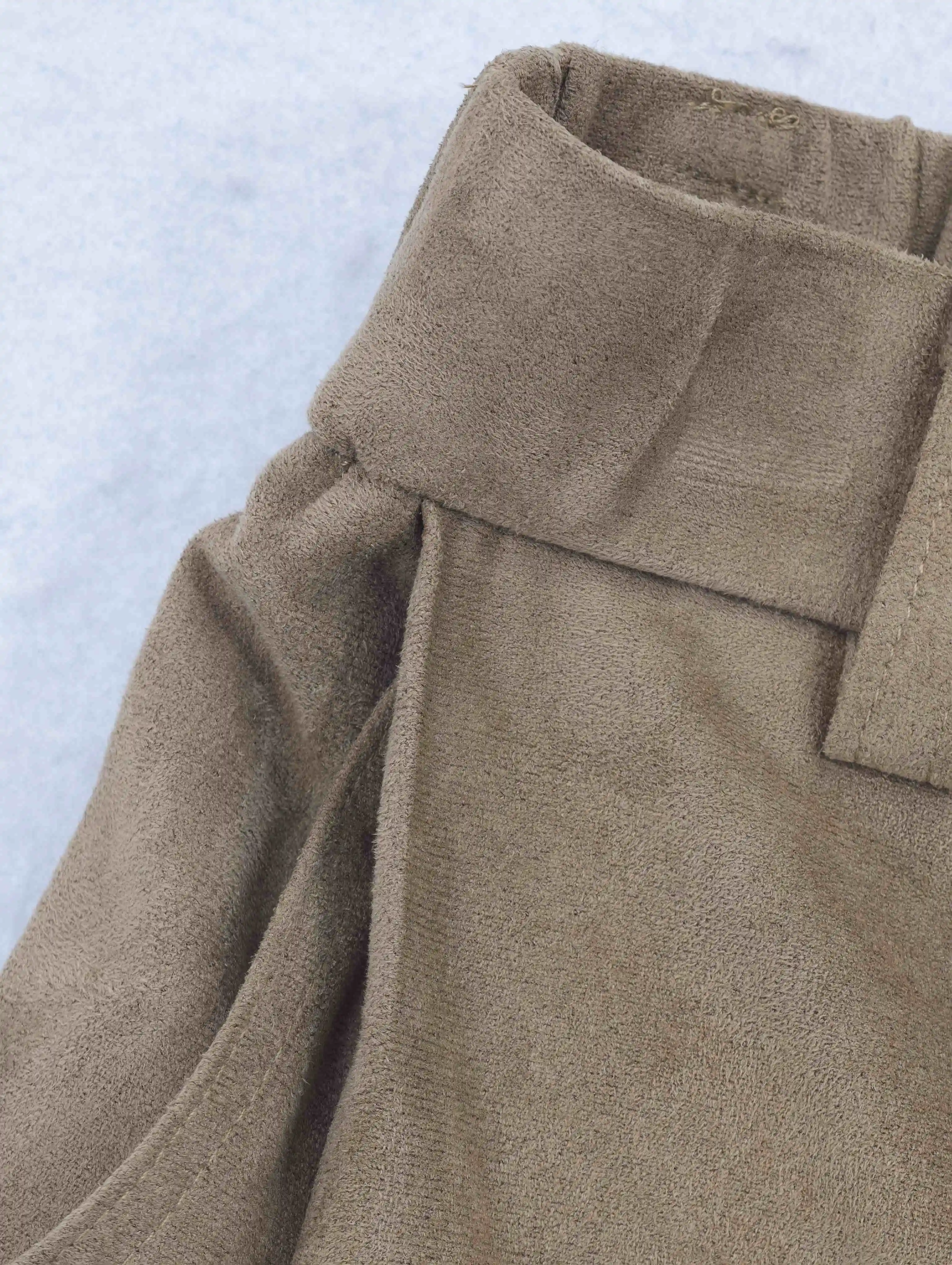 Elastic waistband construction detail on soft stretch fabric
