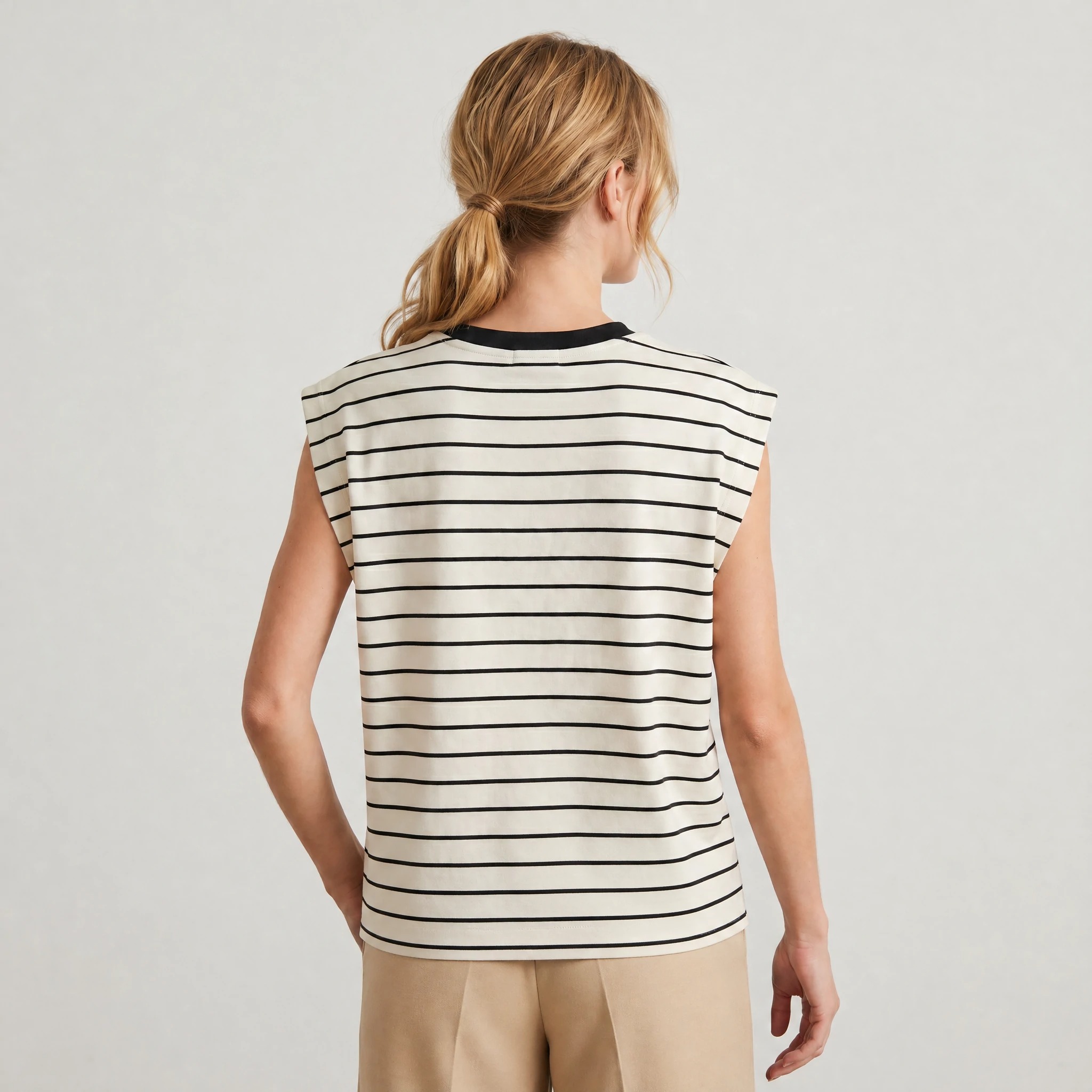 Back view of relaxed striped extended-shoulder sleeveless tee