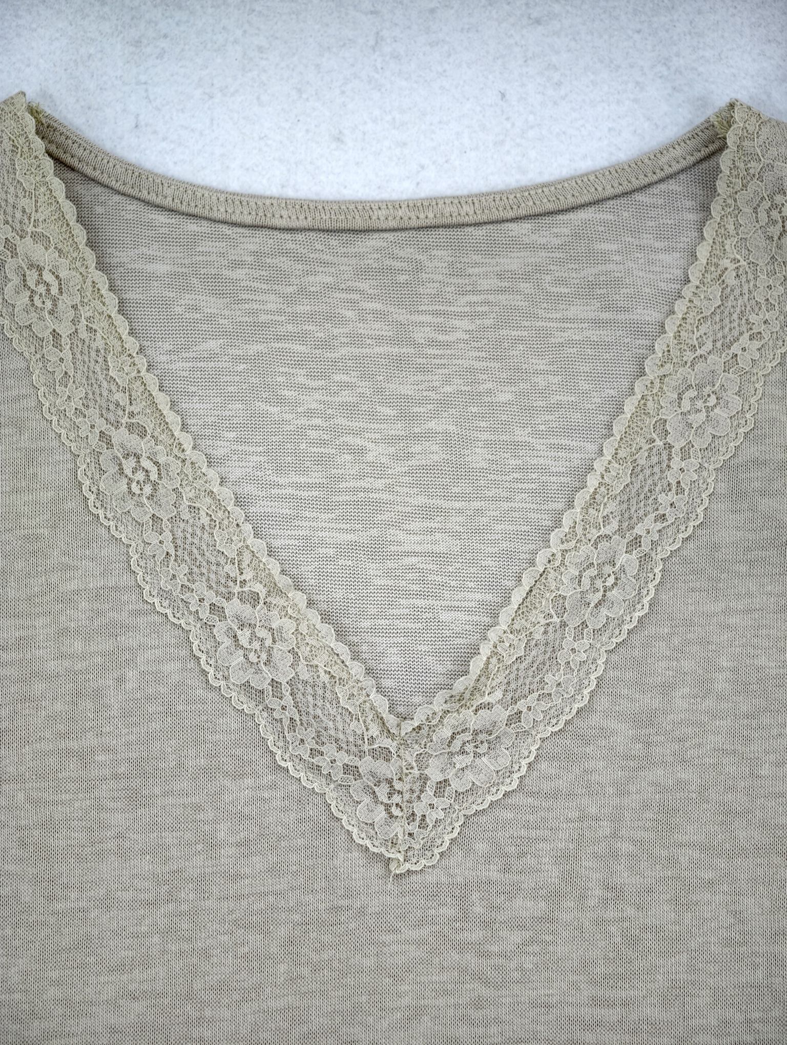 V-neck lace trim on cotton-blend fabric