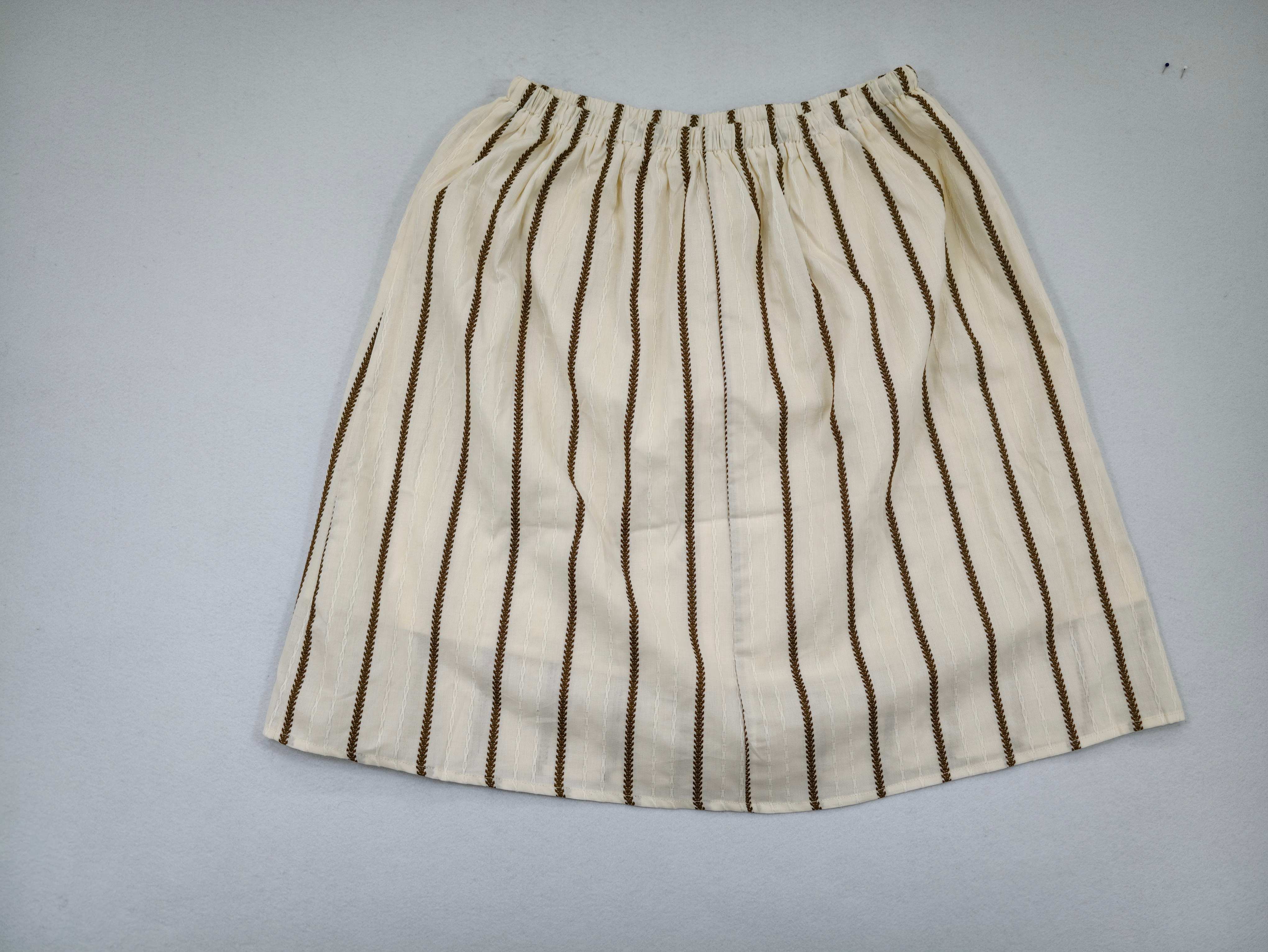 Back flat view of gathered A-line cotton skirt