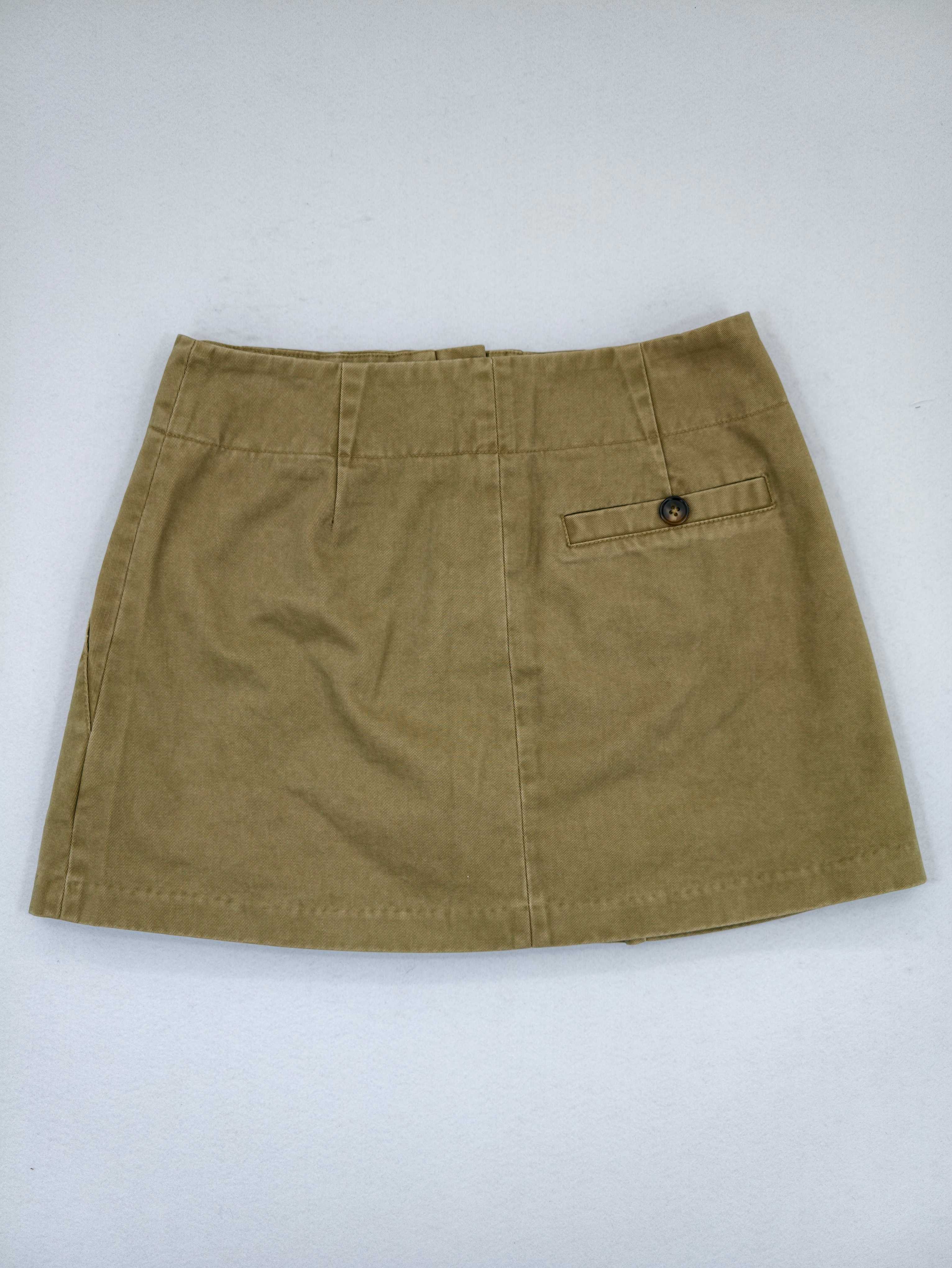 Back view with welt pockets and fitted waistband