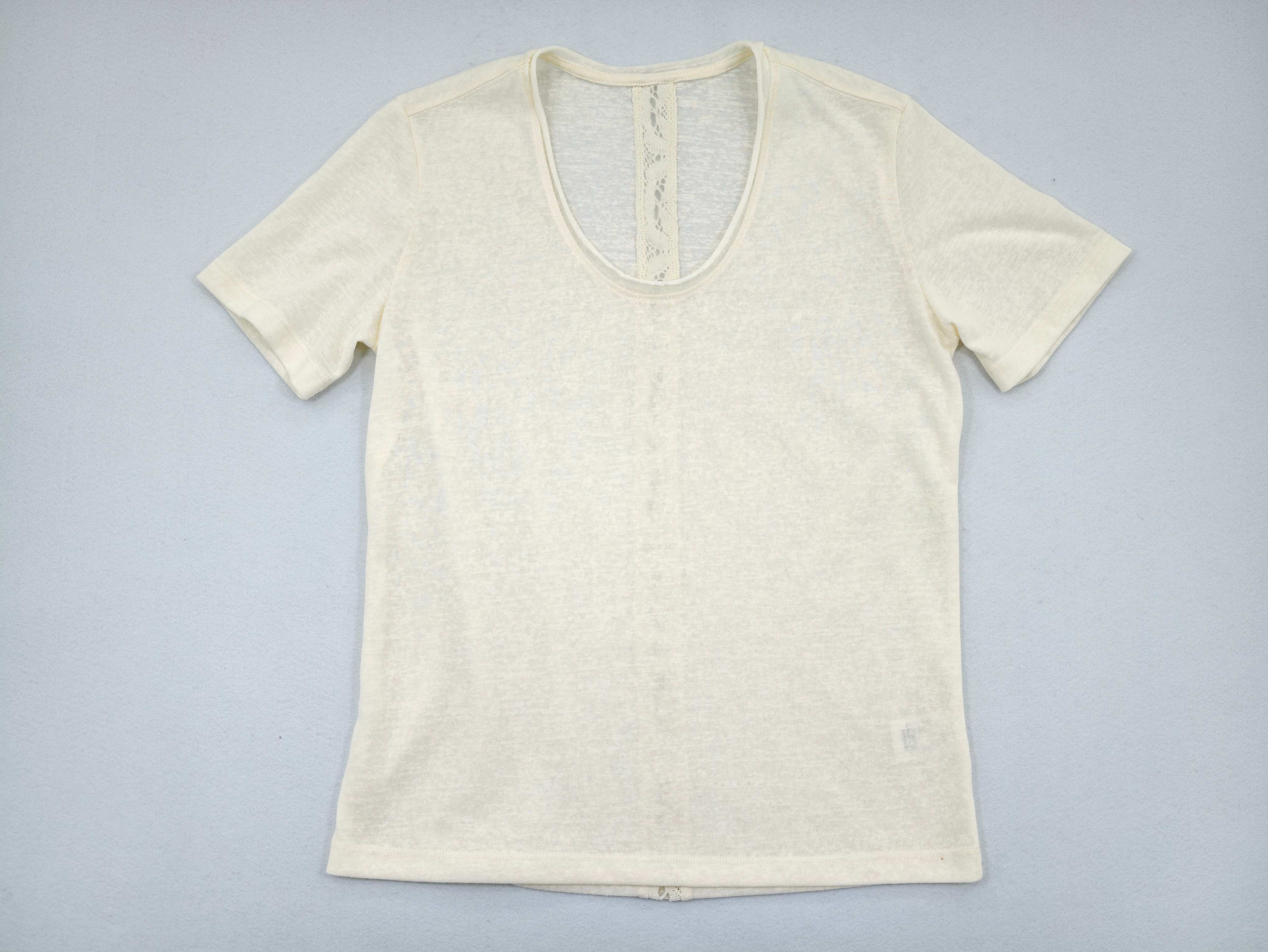 Ivory textured scoop-neck T-shirt laid flat from front