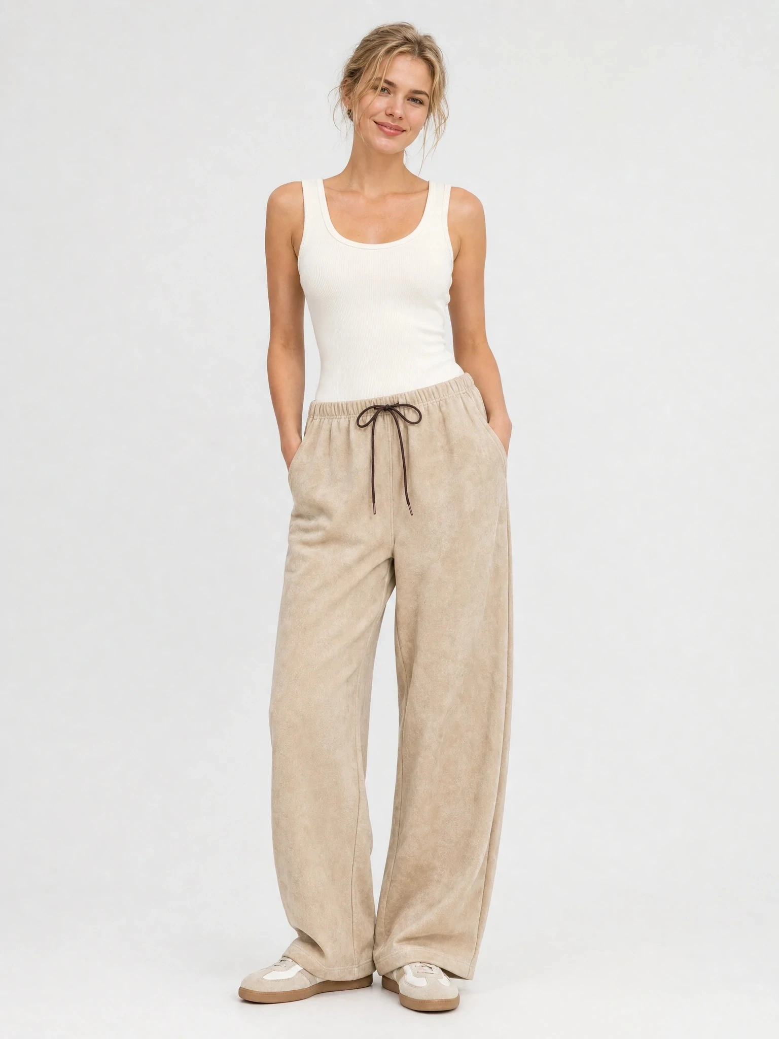Women wearing taupe suede-touch wide-leg lounge pants