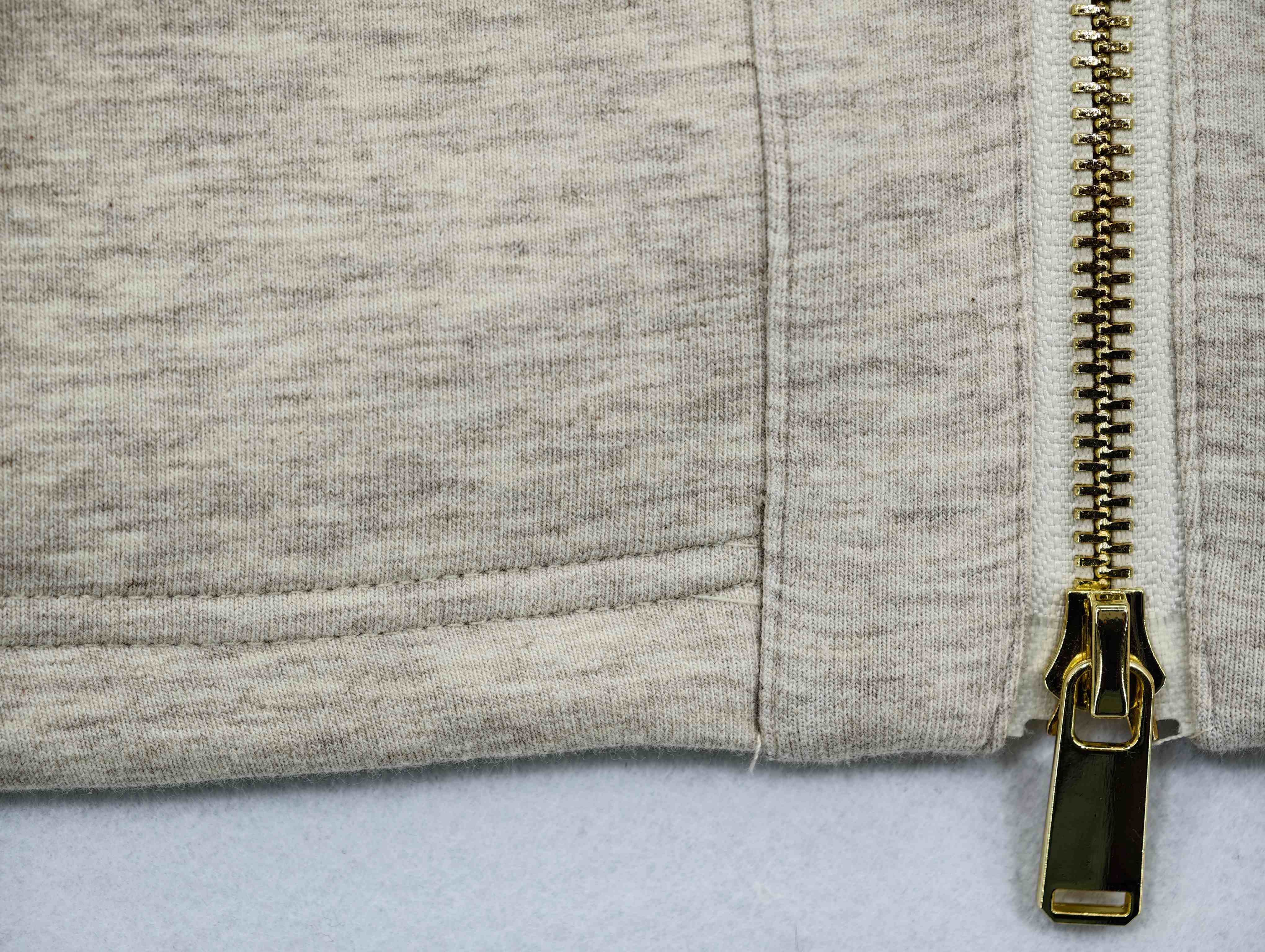 Woolen-effect scuba texture with clean pocket stitching
