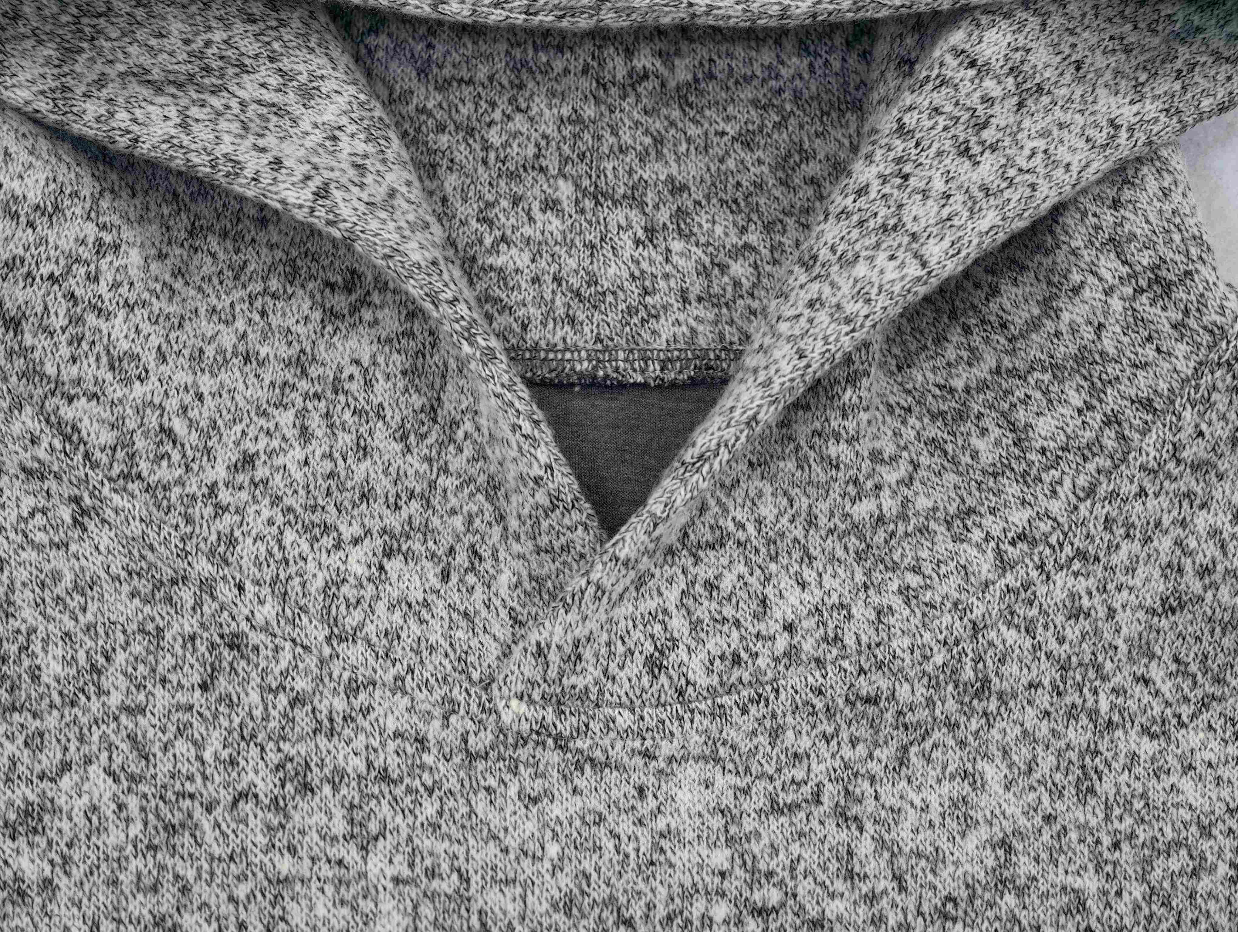Open neckline and hood construction detail close-up