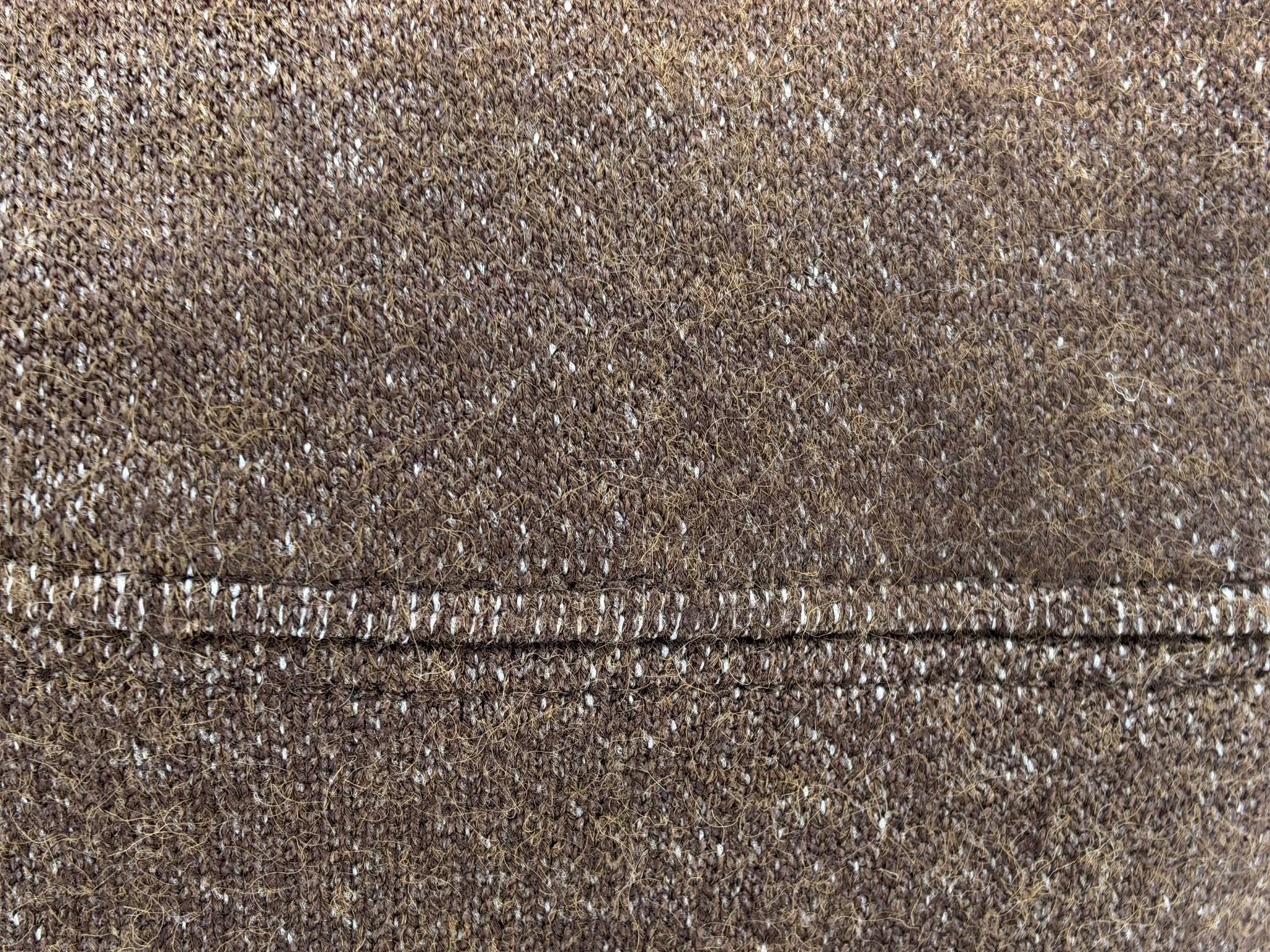 Cashmere-touch Hacci texture and hem stitching detail