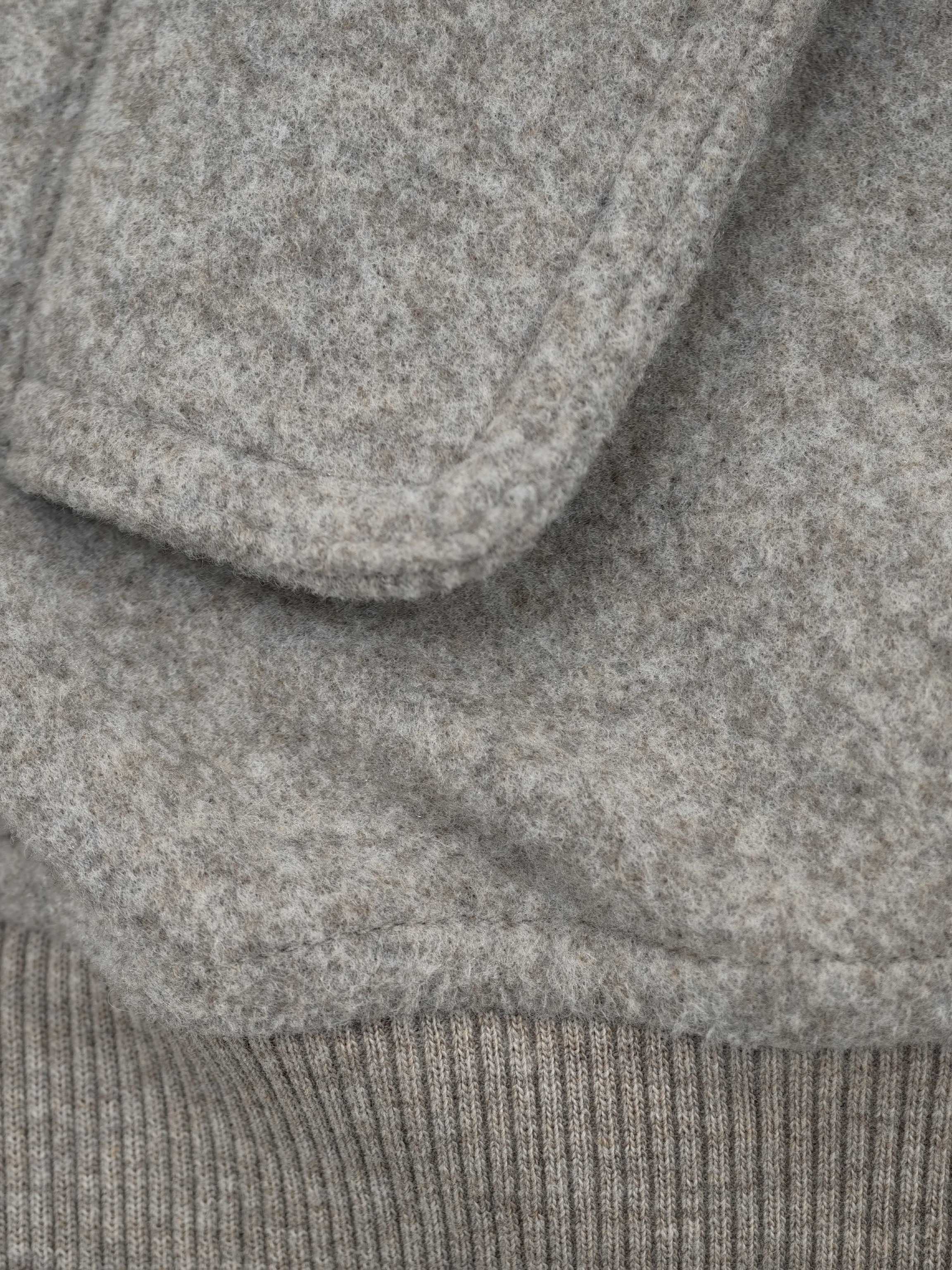 Textured wool-blend flap pocket for custom jacket development