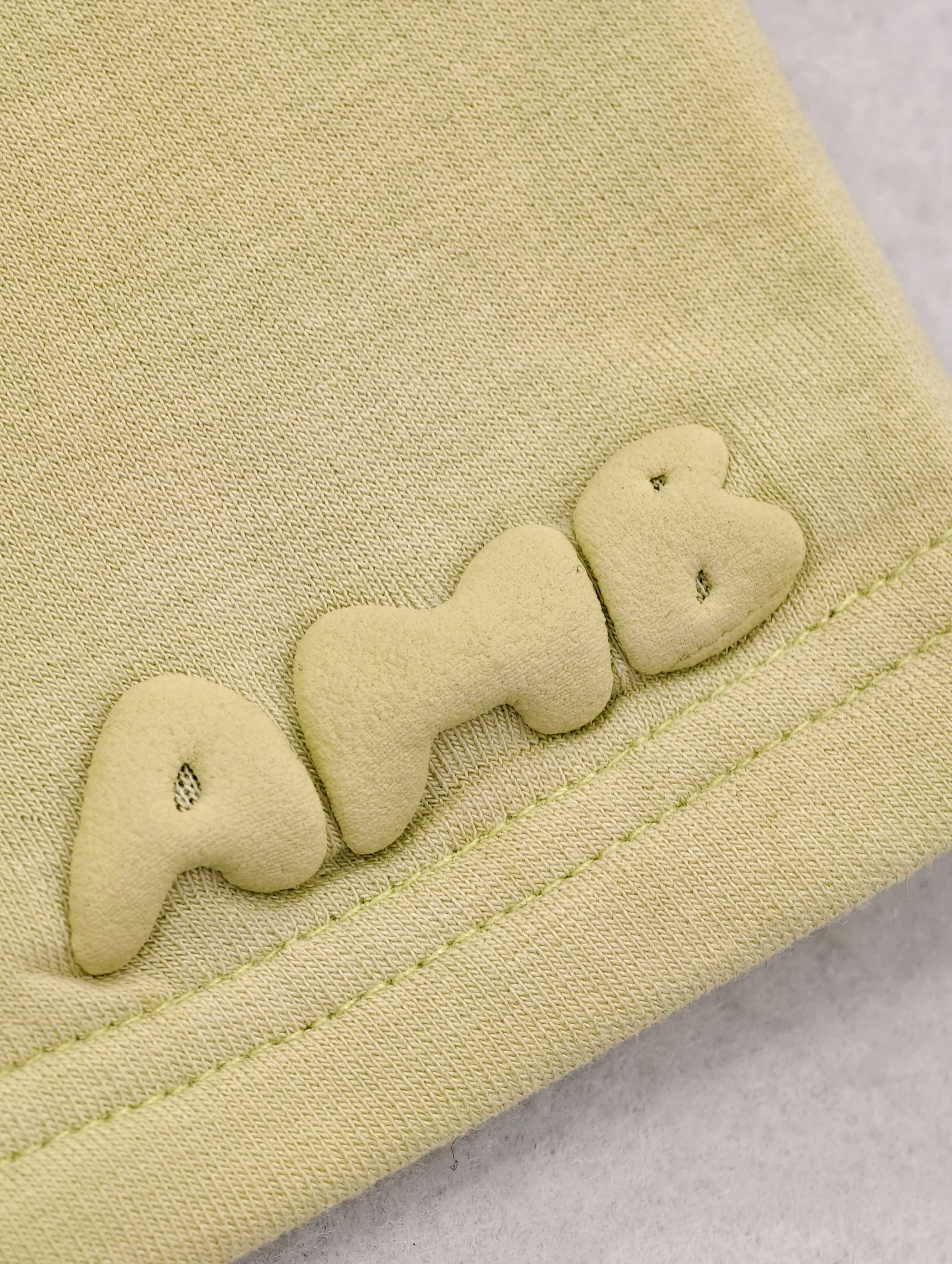 Embroidered logo detail on lounge shorts fabric