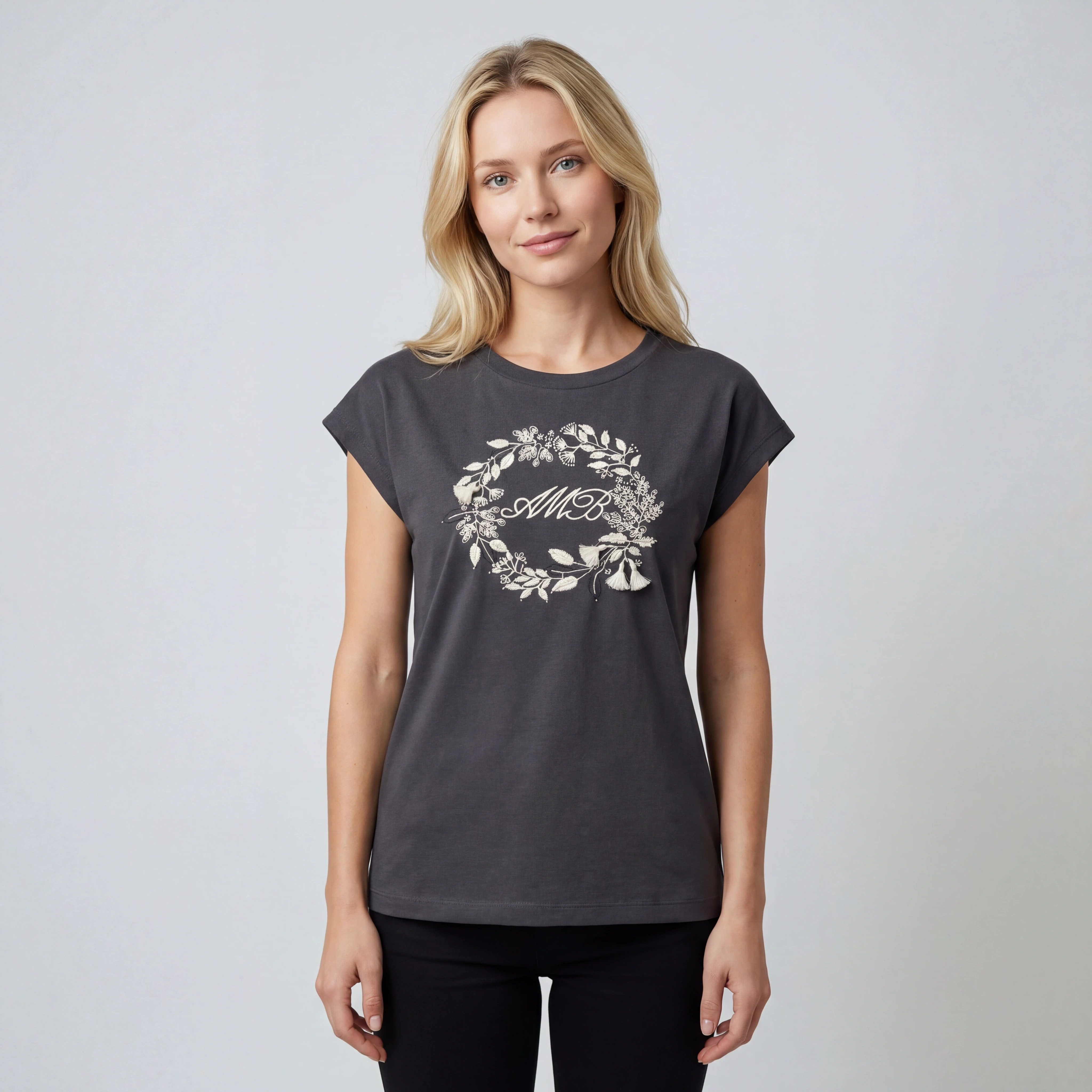 Charcoal cap-sleeve floral wreath T-shirt styled on model
