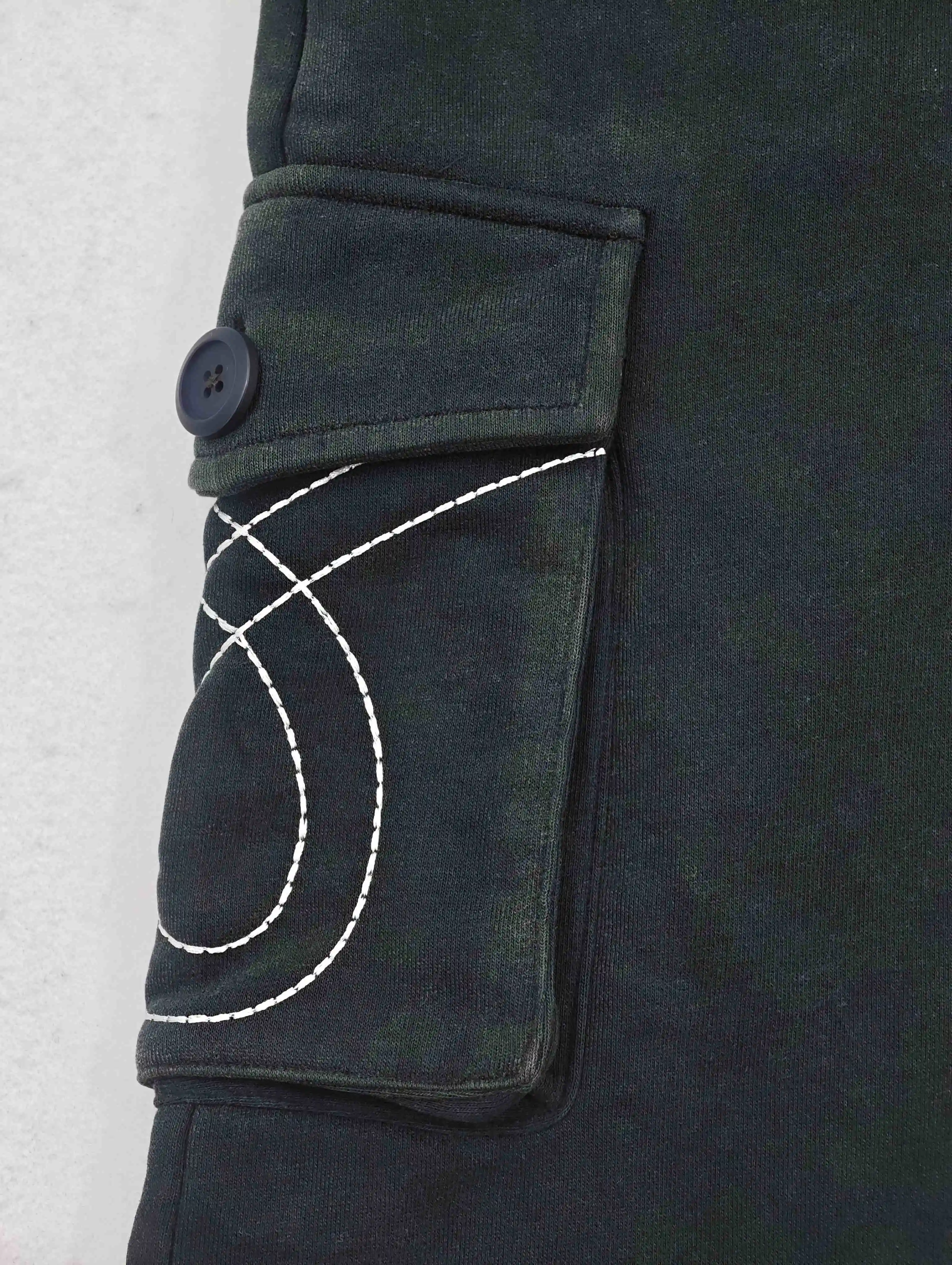 Cargo pocket with white curved embroidery detail
